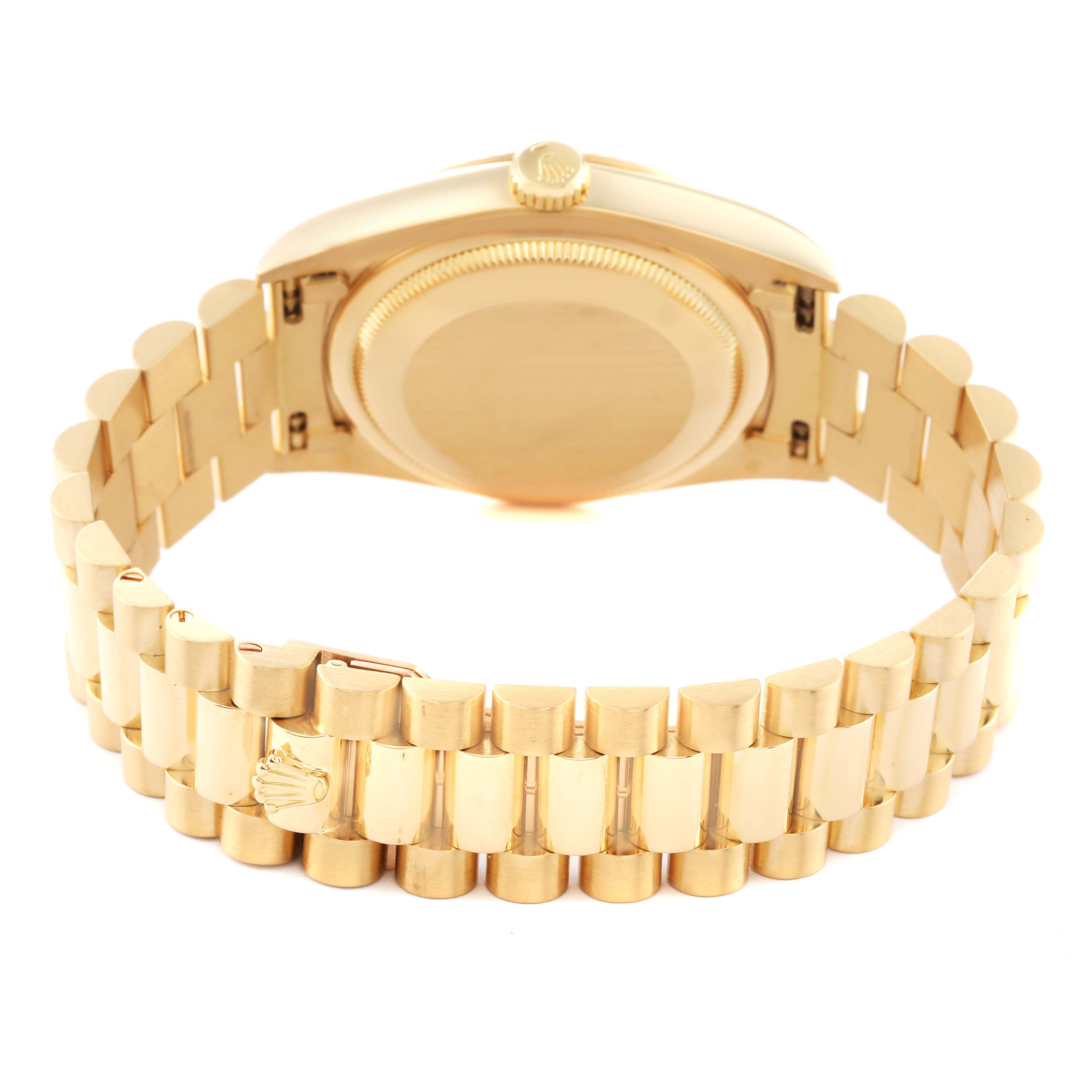 This image shows the backside of a Rolex President 18238 Men
s Yellow Gold Champagne Dial 18238 Men
s Yellow Gold Champagne Dial model watch, highlighting the gold bracelet and the case back.