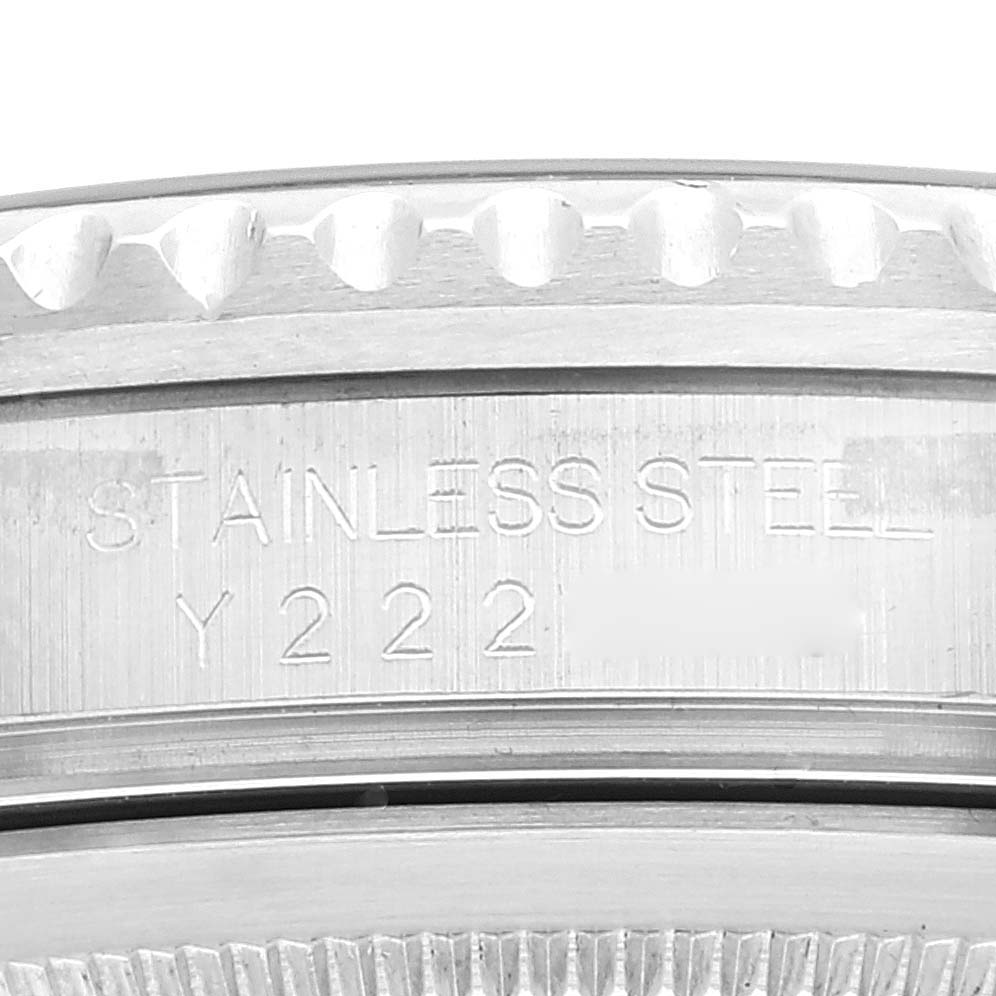 This close-up image shows the side of a Rolex GMT-Master 16710 Men
s Stainless Steel Black Dial 16710 Men
s Stainless Steel Black Dial watch case, highlighting the engraved model and material details.