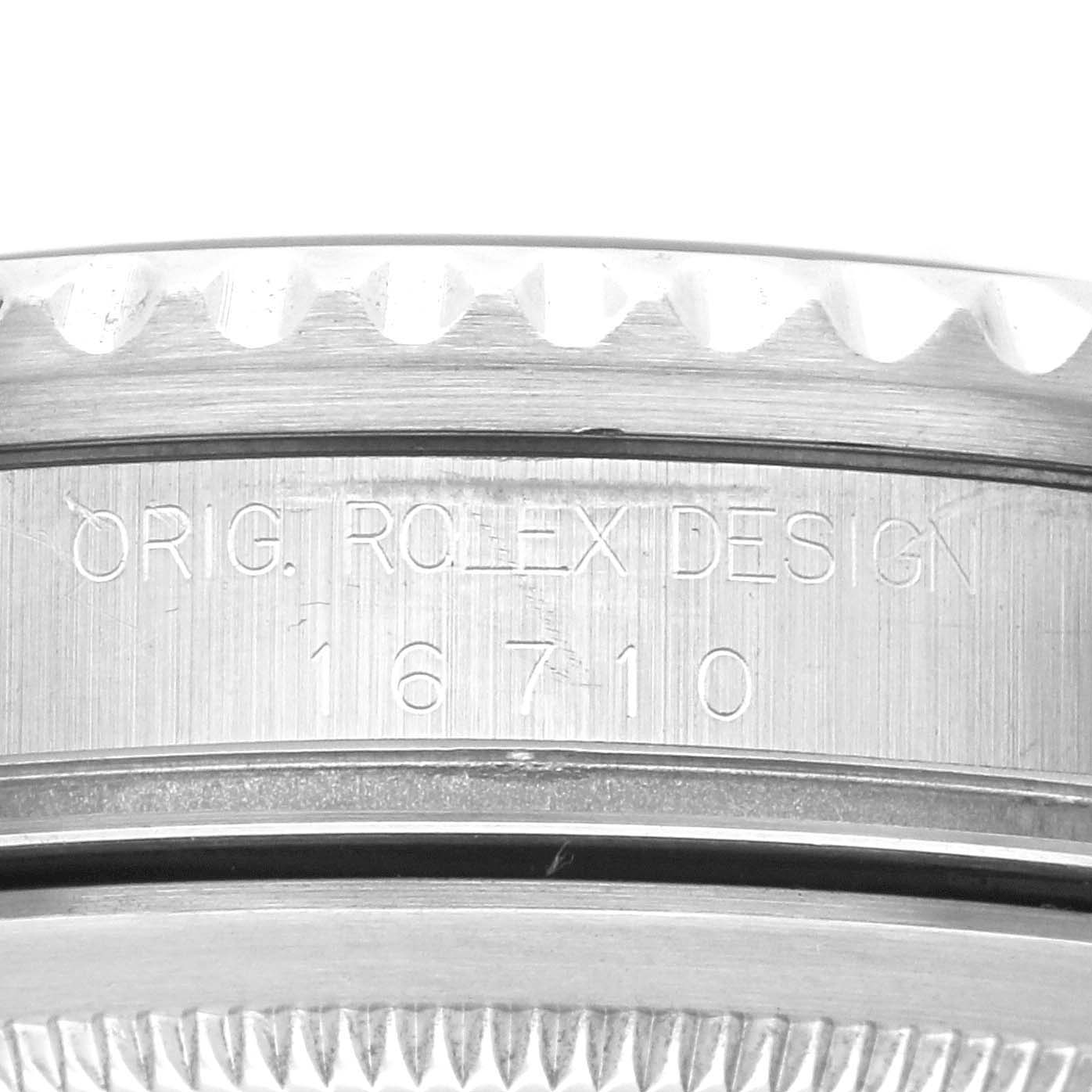 The image shows a close-up view of the edge and engraved design number "16710" on a Rolex GMT-Master 16710 Men's Stainless Steel Black Dial 16710 Men's Stainless Steel Black Dial watch case.