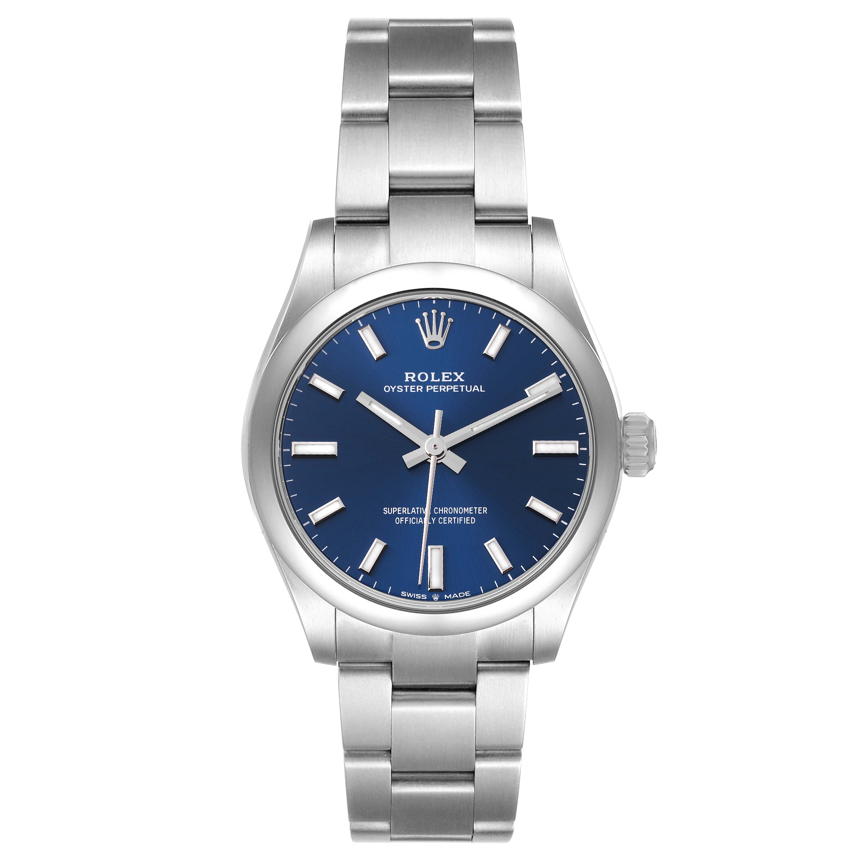 This Rolex Mid-Size 277200 Women
s Stainless Steel Blue Dial 277200 Women
s Stainless Steel Blue Dial model watch features a silver bracelet, blue dial, and is shown from a front angle.