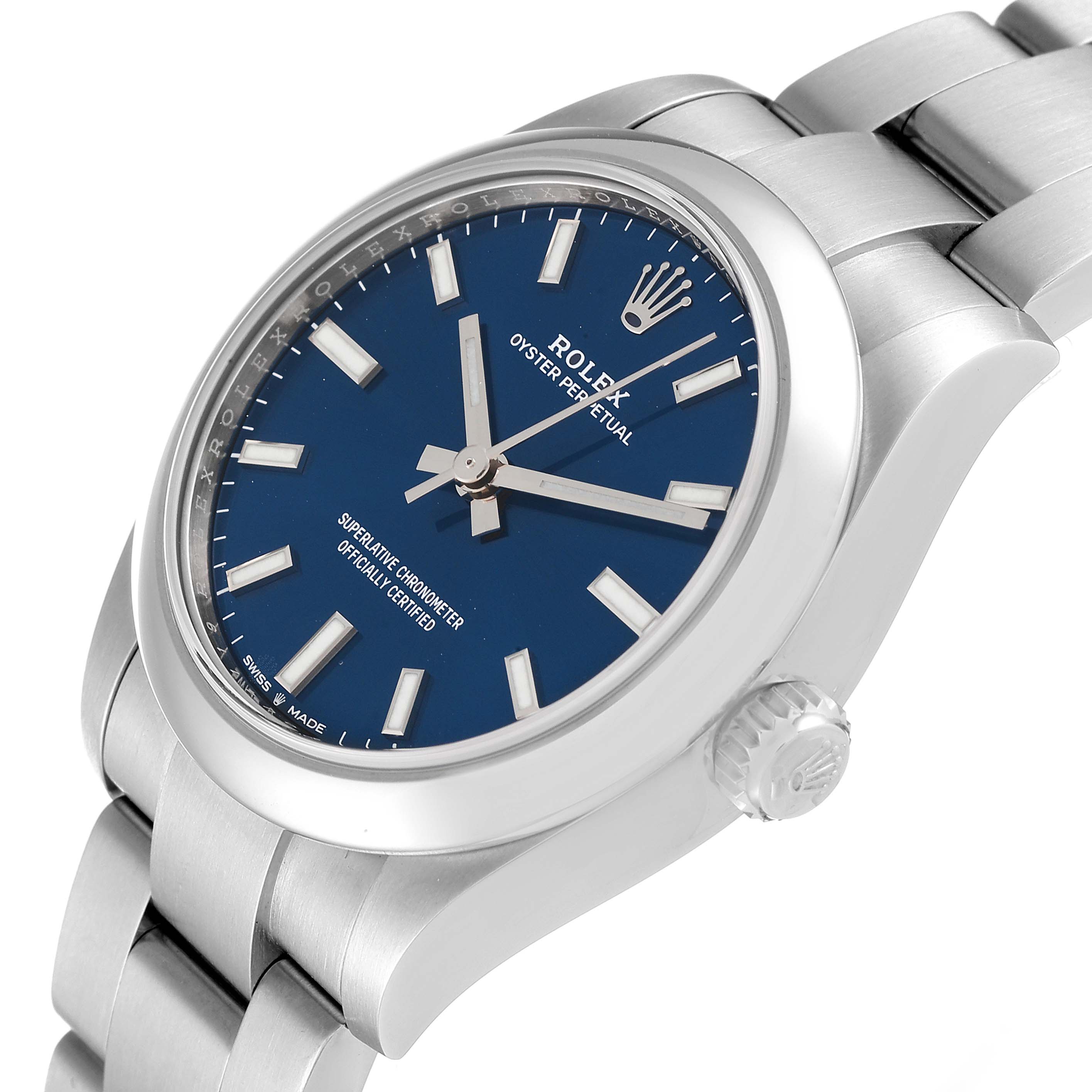 This Rolex Oyster Perpetual Mid-Size watch is shown at a three-quarter angle highlighting the blue dial, bezel, crown, and part of the bracelet.