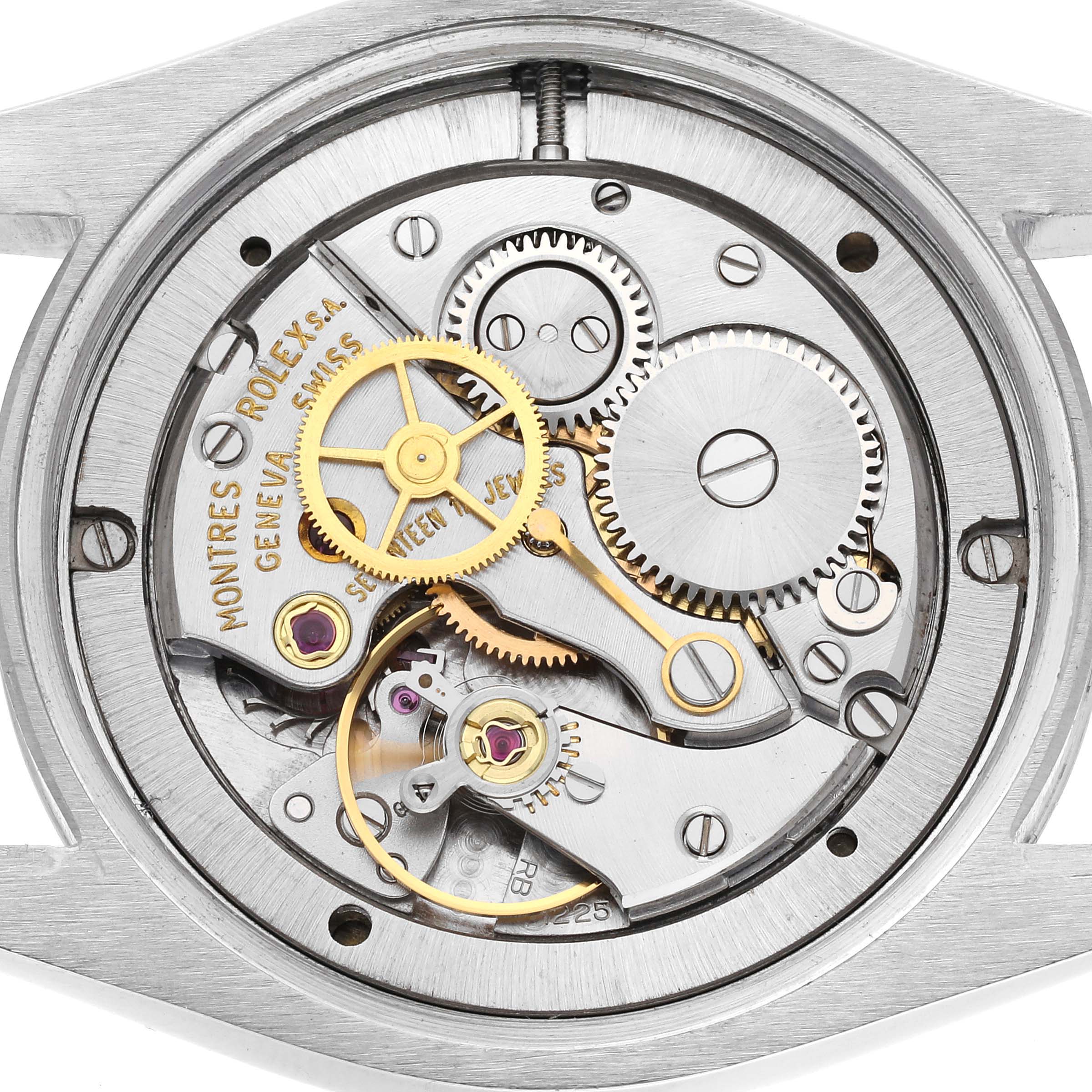 This image shows the intricate internal mechanical movement and gears of the Vintage Collection model by Rolex from the back side.