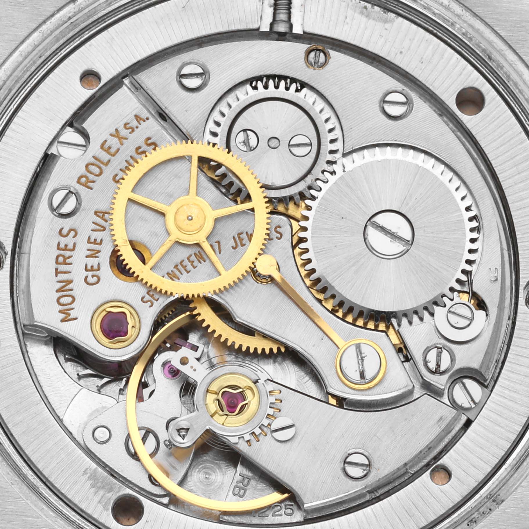 This image shows a close-up of the inner mechanical movement of a Vintage Collection Rolex watch.