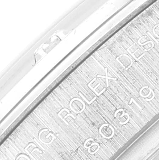 This close-up image shows a side portion of the Rolex Pearlmaster 80319 Women's White Gold White Dial 80319 Women's White Gold White Dial watch, highlighting the engraved "ORIG ROLEX DESIGN" text.