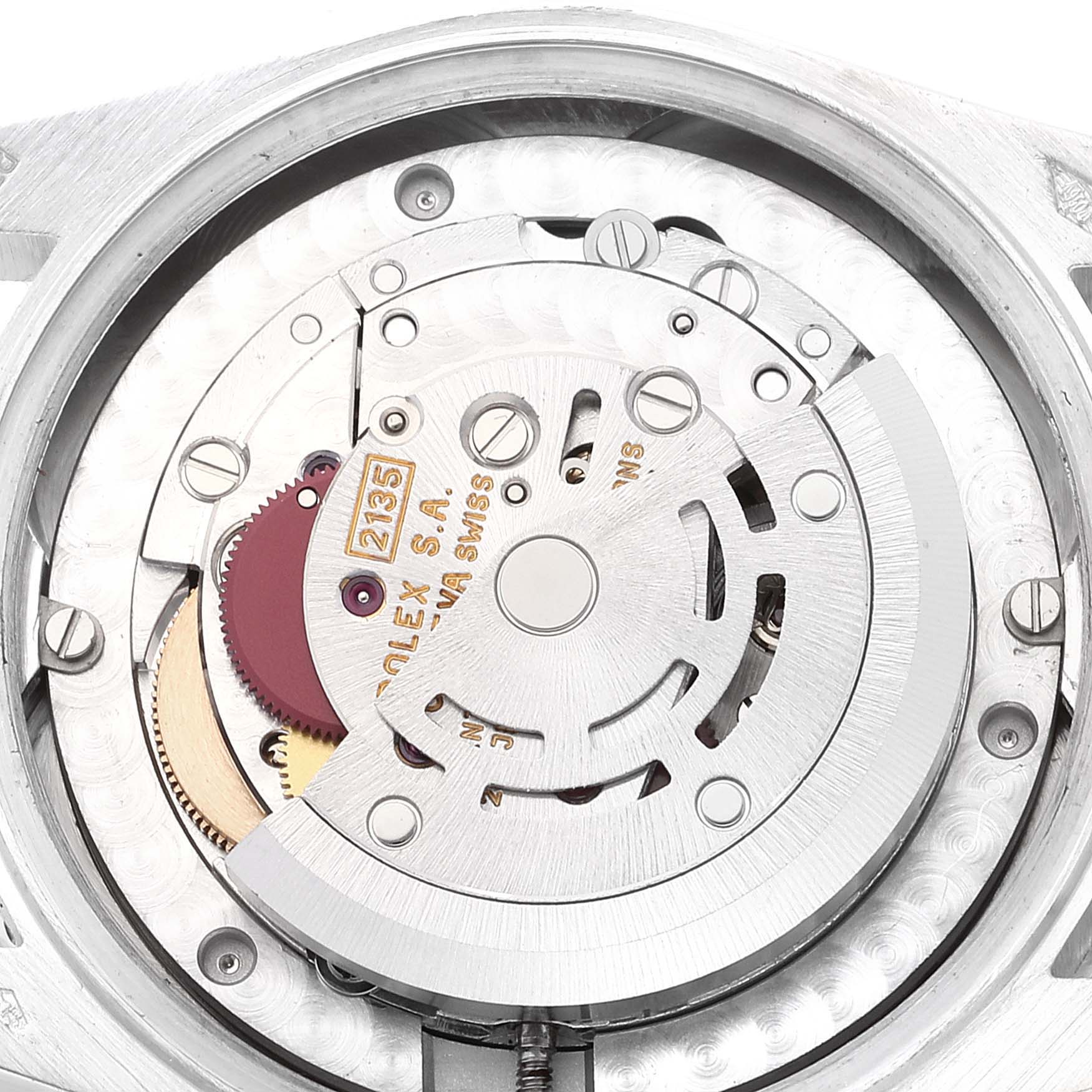 The image shows the intricate inner mechanism of a Rolex President 68286 Women's Platinum Silver Dial 68286 Women's Platinum Silver Dial model watch from a rear view angle.