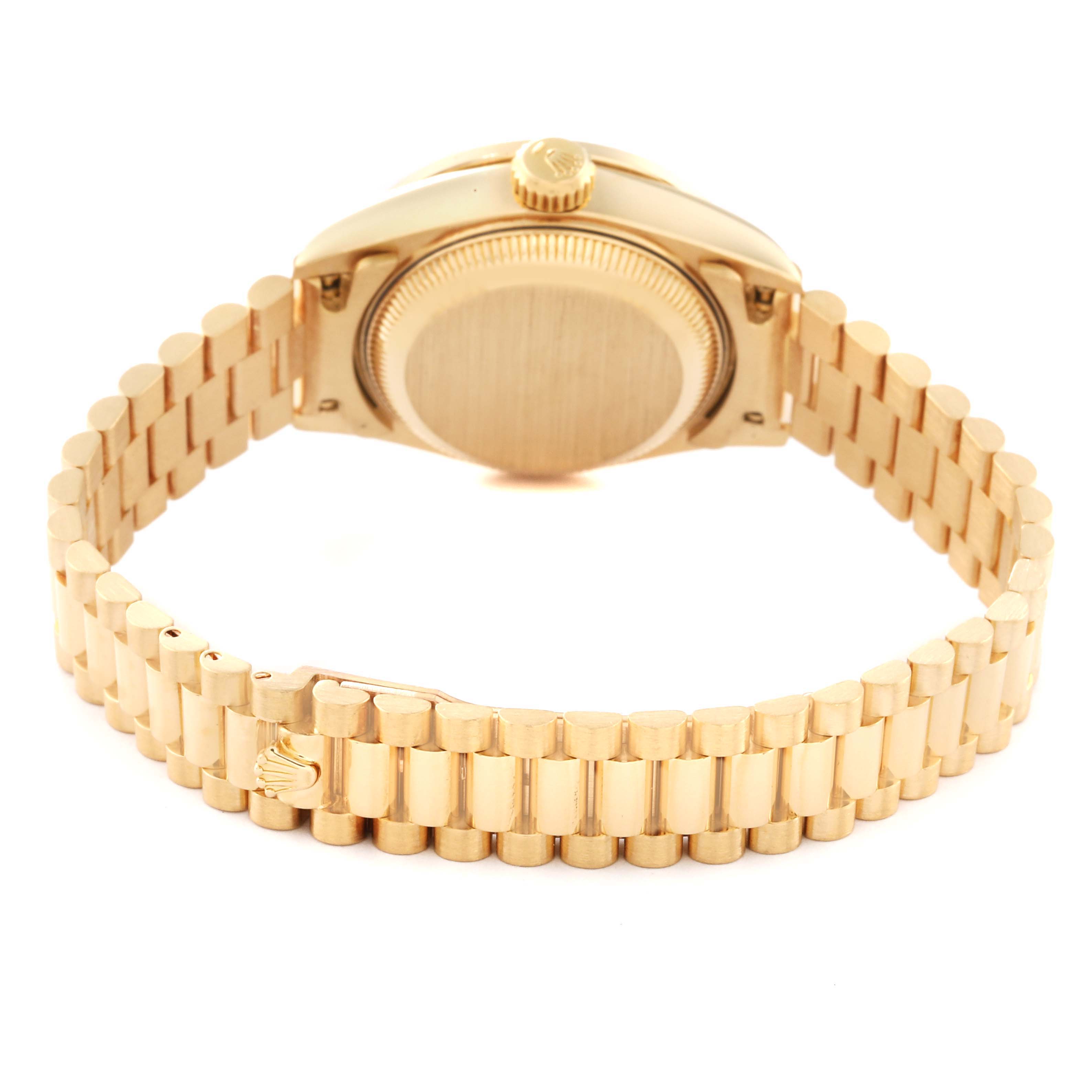 The image shows the back case and bracelet of a Rolex President 69068 Women's Yellow Gold Champagne Dial 69068 Women's Yellow Gold Champagne Dial model watch at a slight overhead angle.