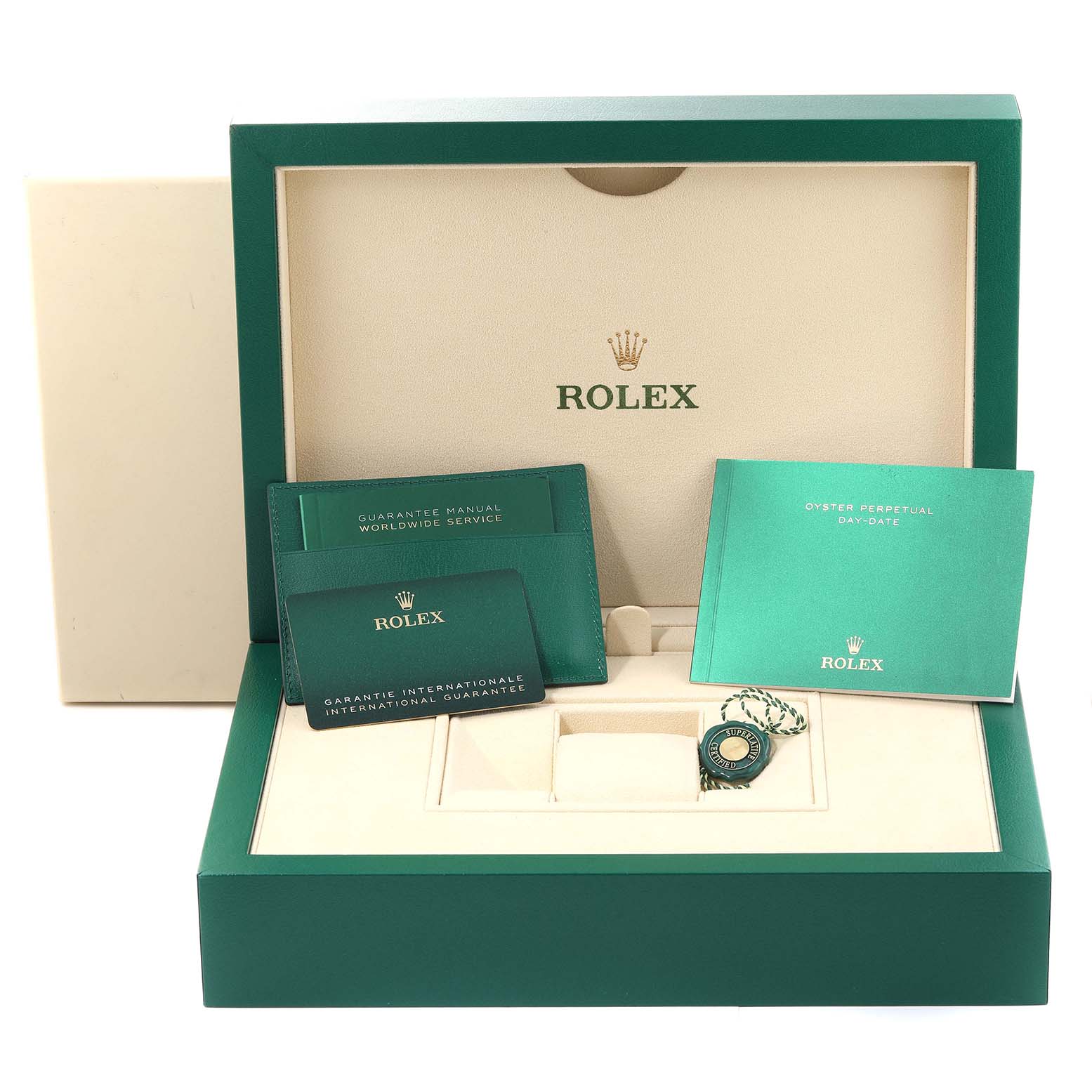 The image shows the packaging and accessories for a Rolex President 228206 Men's Platinum Blue Dial 228206 Men's Platinum Blue Dial watch, including the box, manuals, and tags.