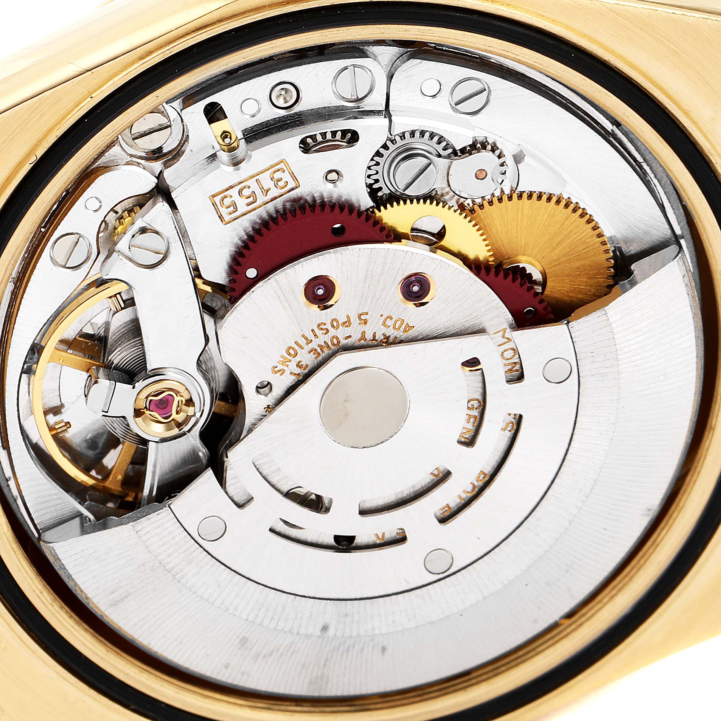 This image shows the internal movement mechanism of a Rolex President 18238 Men
s Yellow Gold Champagne Dial 18238 Men
s Yellow Gold Champagne Dial model watch, including gears and components. 