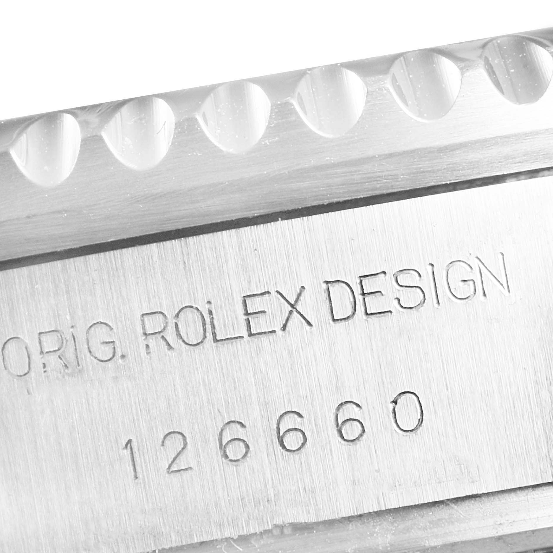 The image shows a close-up view of the bezel and engraved case side of a Rolex Sea-Dweller 126660 Men's Stainless Steel Blue Dial 126660 Men's Stainless Steel Blue Dial watch, displaying "ORIG. ROLEX DESIGN" and model number 126660.