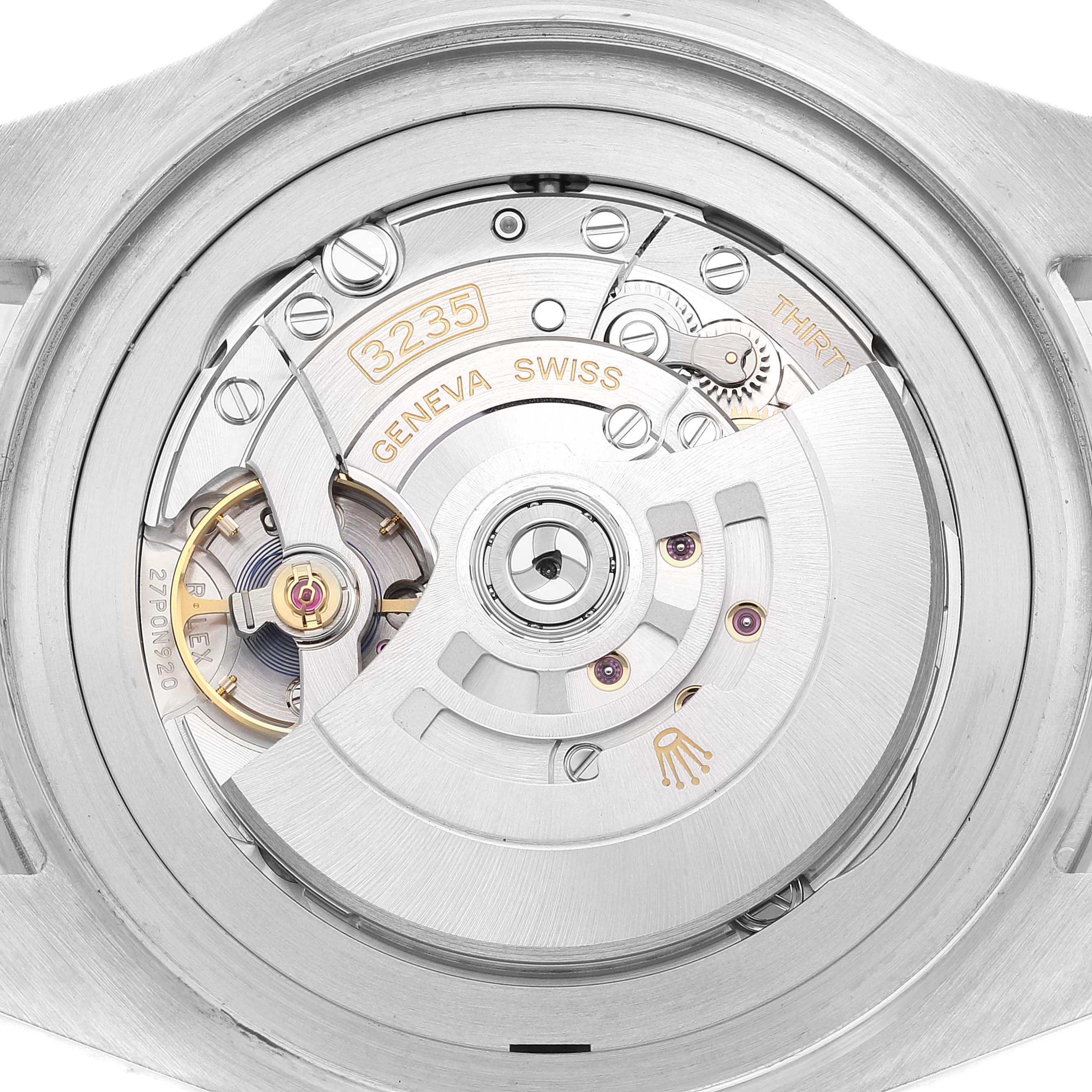 The image shows a close-up view of the movement and inner mechanism of a Rolex Sea-Dweller 126660 Men's Stainless Steel Blue Dial 126660 Men's Stainless Steel Blue Dial model, highlighting its intricate components.