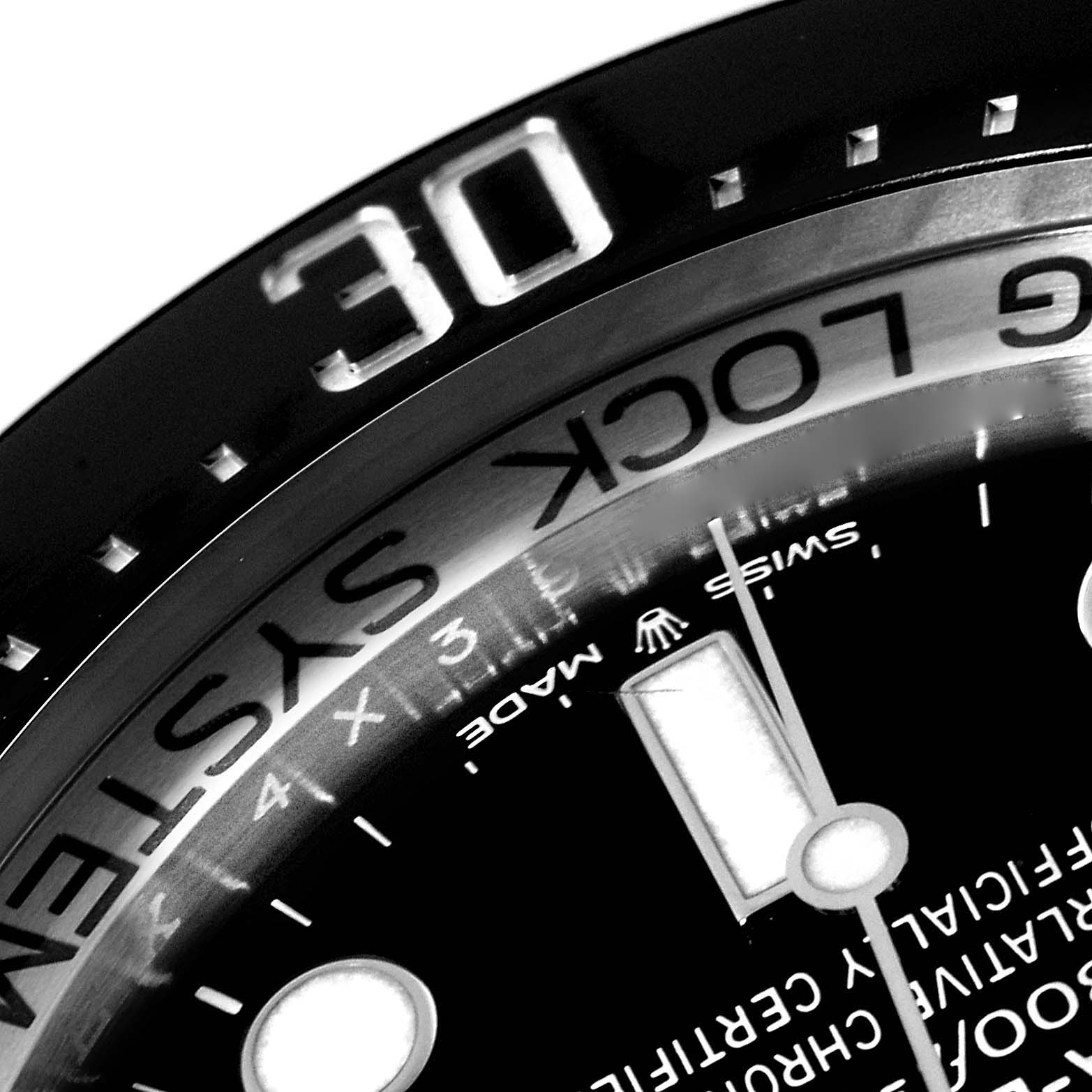 This close-up image of the Rolex Sea-Dweller 126660 Men's Stainless Steel Blue Dial 126660 Men's Stainless Steel Blue Dial watch shows the dial, markers, and part of the bezel at an angle.