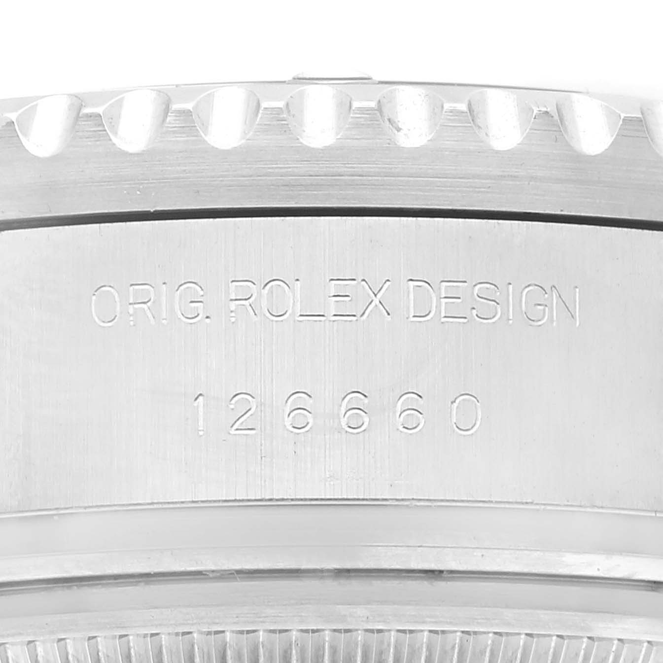 The image shows a close-up view of the engraved case back of the Rolex Sea-Dweller 126660 Men's Stainless Steel Blue Dial 126660 Men's Stainless Steel Blue Dial model.