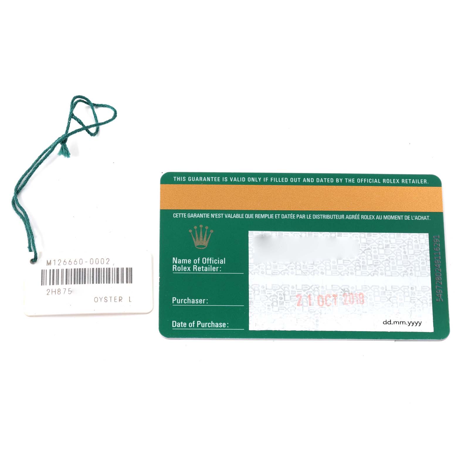 This image shows an authenticity card and a tag for the Rolex Sea-Dweller 126660 Men's Stainless Steel Blue Dial 126660 Men's Stainless Steel Blue Dial model watch.