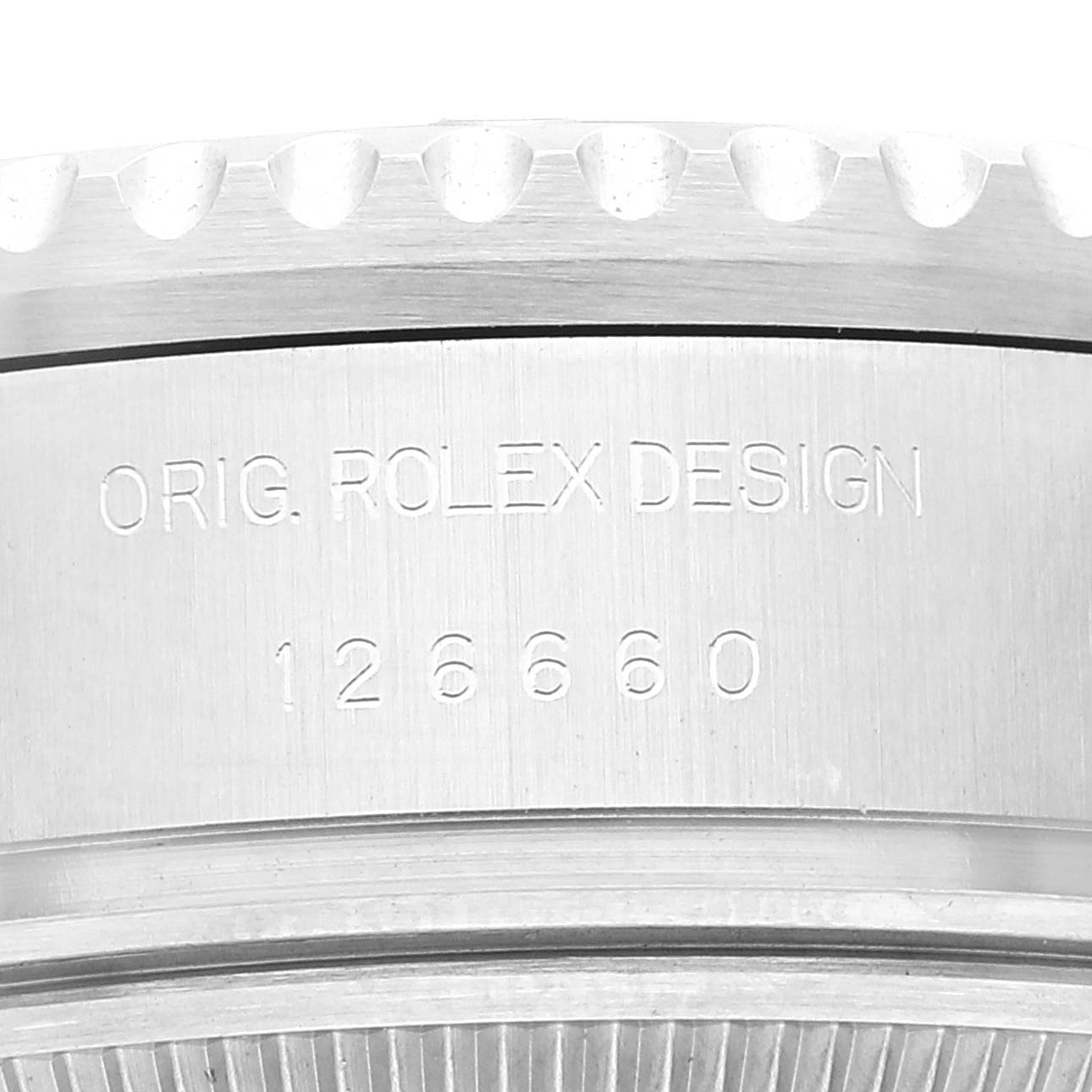 This image shows a close-up of the edge and case back of a Rolex Sea-Dweller 126660 Men's Stainless Steel Black Dial 126660 Men's Stainless Steel Black Dial watch with the model number 126660.