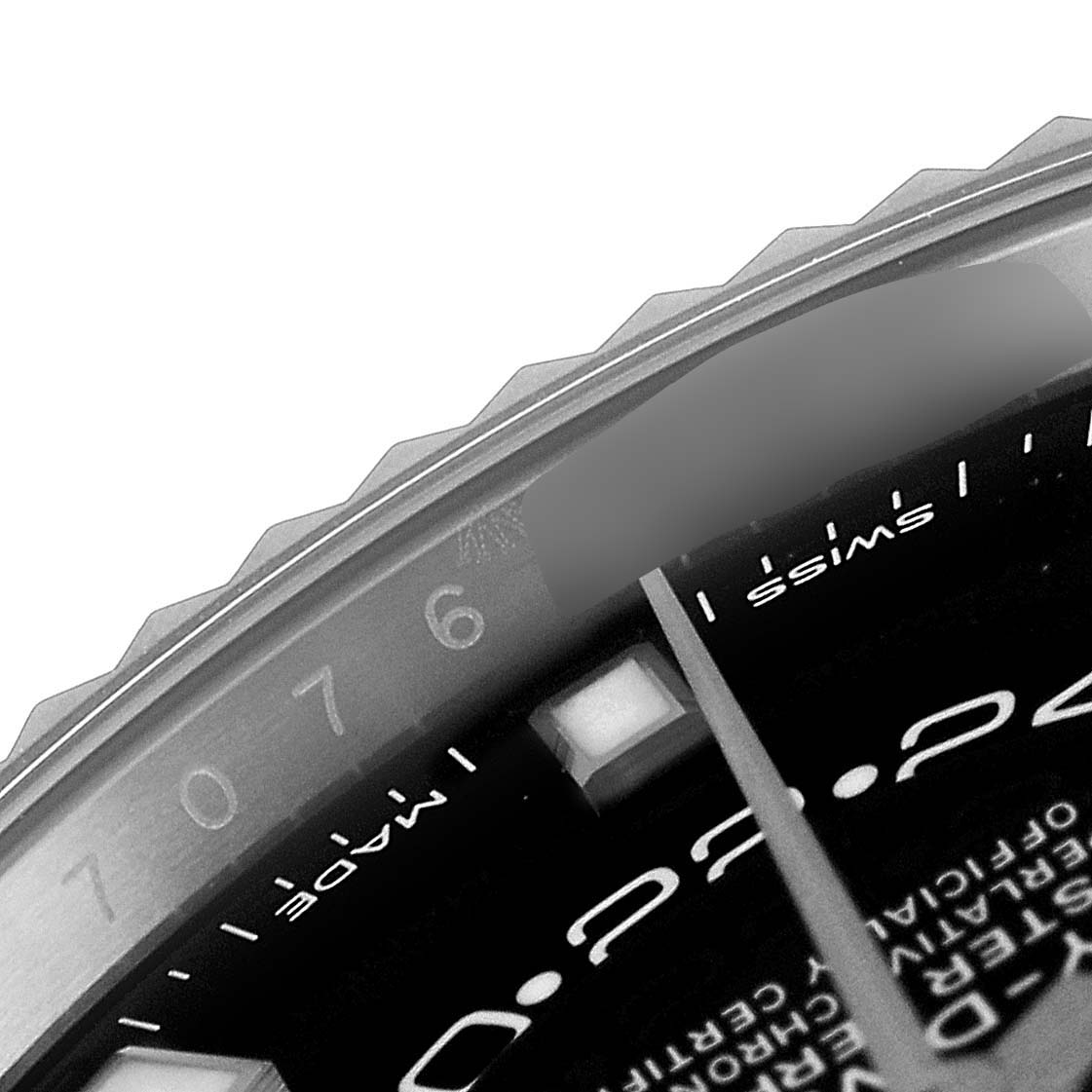 The image shows a close-up of the dial and part of the bezel of the Rolex Sky-Dweller 326934 Men's Stainless Steel Black Dial 326934 Men's Stainless Steel Black Dial watch, including the 6 o'clock mark and "Swiss Made" text.