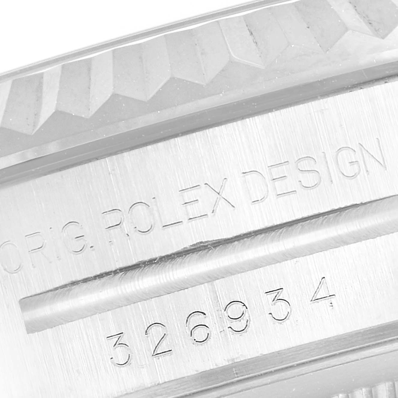 The close-up image shows the engraved bezel and side of a Rolex Sky-Dweller 326934 Men's Stainless Steel Black Dial 326934 Men's Stainless Steel Black Dial.