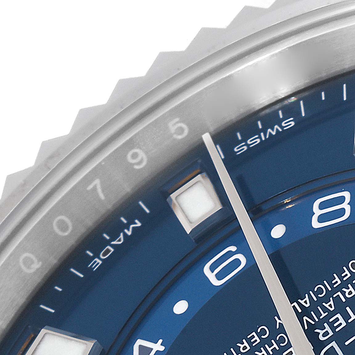 This close-up image shows the blue dial, silver hand, and part of the bezel of a Rolex Sky-Dweller 326934 Men's Stainless Steel Blue Dial 326934 Men's Stainless Steel Blue Dial watch.