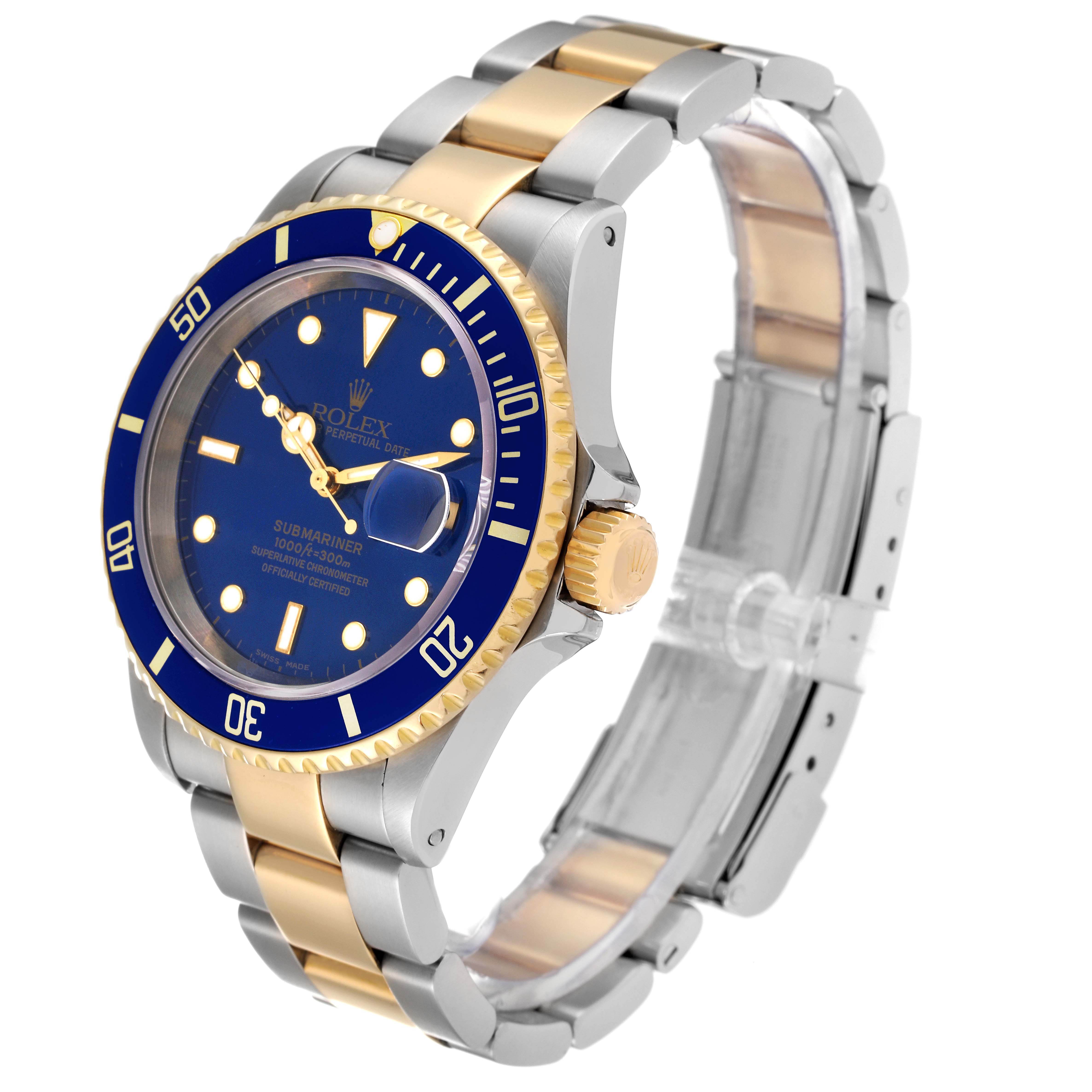 The image shows a Rolex Submariner 16613 Men's Steel and Gold (two tone) Blue Dial 16613 Men's Steel and Gold (two tone) Blue Dial watch at a slight angle, highlighting its blue dial, bezel, and two-tone metal bracelet.