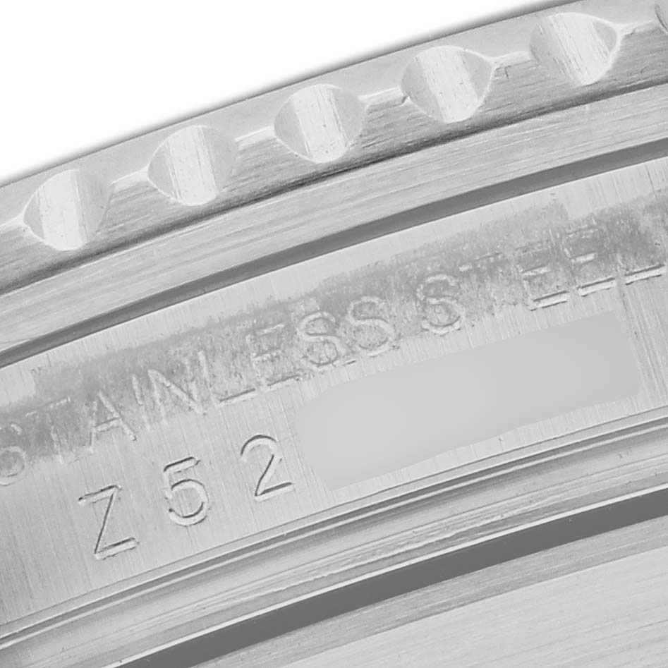 Close-up of the case back and serial number engraving on a Rolex Submariner 16610 Men
s Stainless Steel Black Dial 16610 Men
s Stainless Steel Black Dial watch, highlighting the stainless steel material.