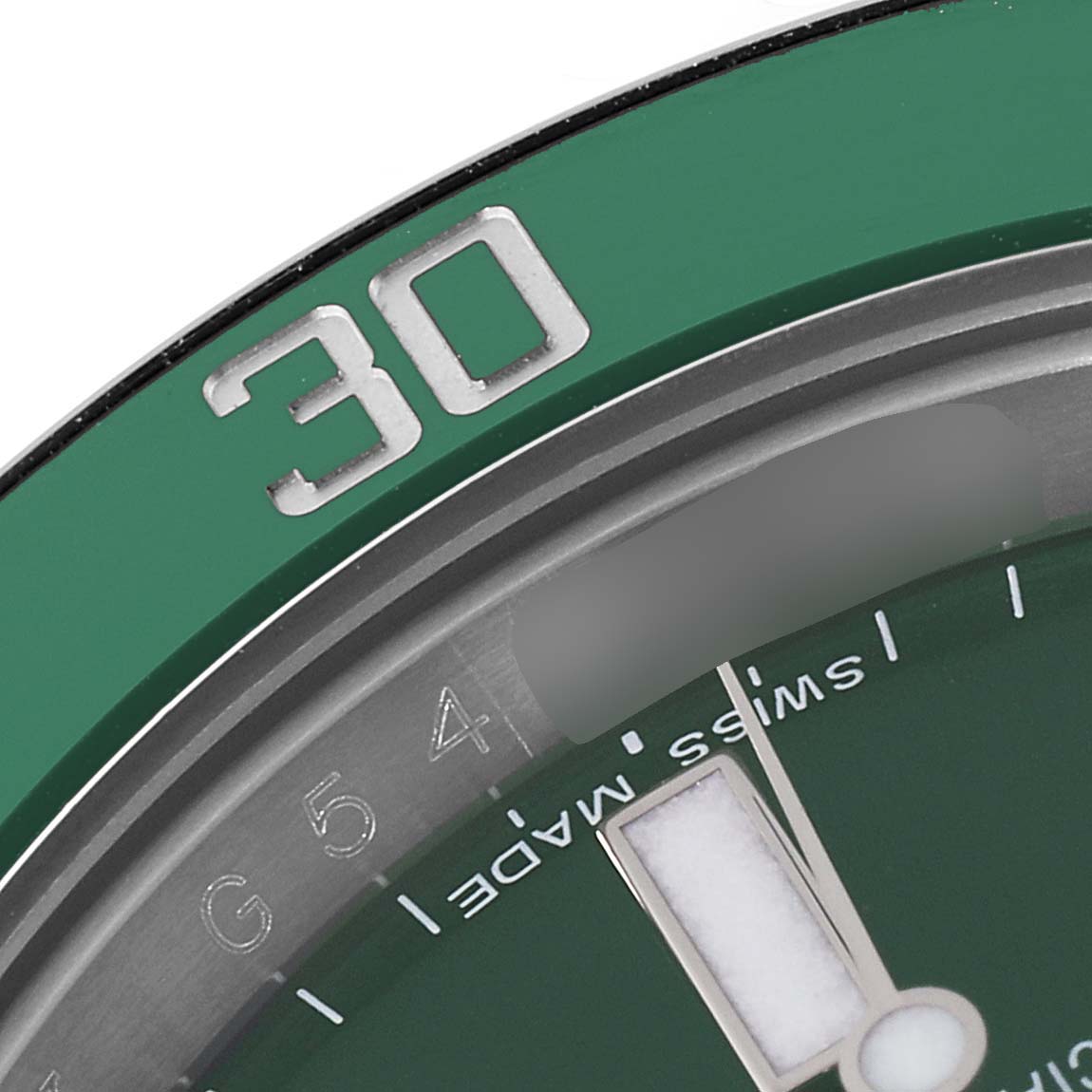 This image shows a close-up of the bezel and dial of a Rolex Submariner 116610LV Men
s Stainless Steel Green Dial 116610LV Men
s Stainless Steel Green Dial with the 30-minute mark prominently displayed.