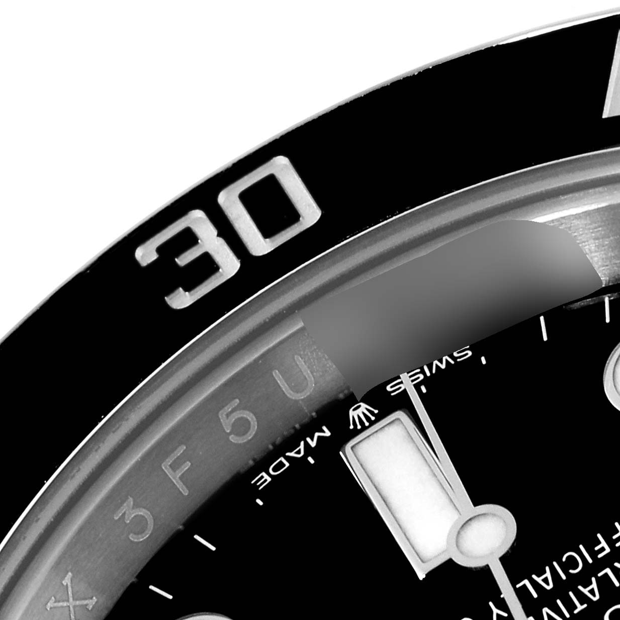 The image shows a close-up of the bezel and watch face of a Rolex Submariner 124060 Men
s Stainless Steel Black Dial 124060 Men
s Stainless Steel Black Dial, highlighting the "30" minute marker and part of the dial.