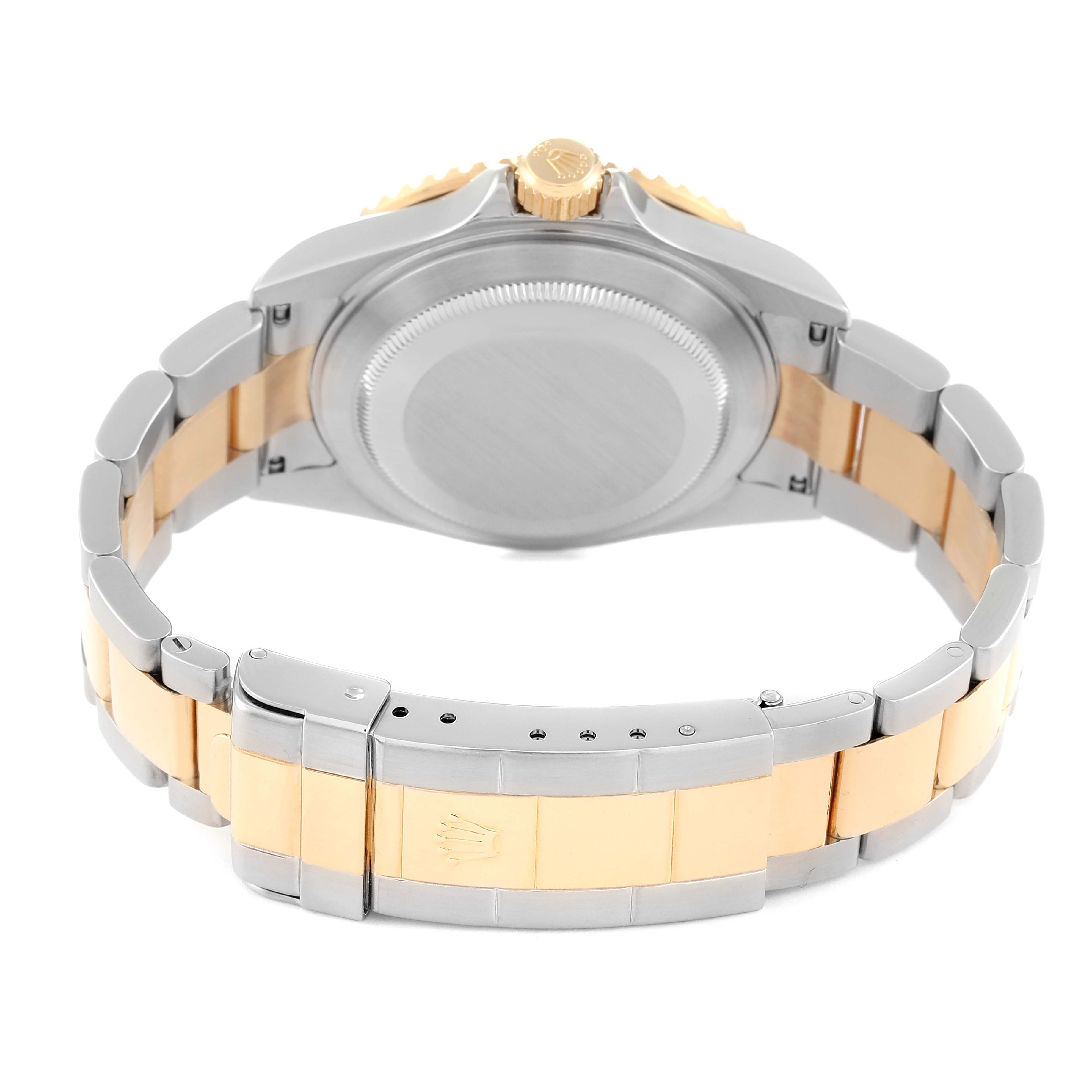 The image shows the rear side of a Rolex Submariner 16613 Men's Steel and Gold (two tone) Black Dial 16613 Men's Steel and Gold (two tone) Black Dial watch, featuring the case back, crown, and the two-tone bracelet clasp.