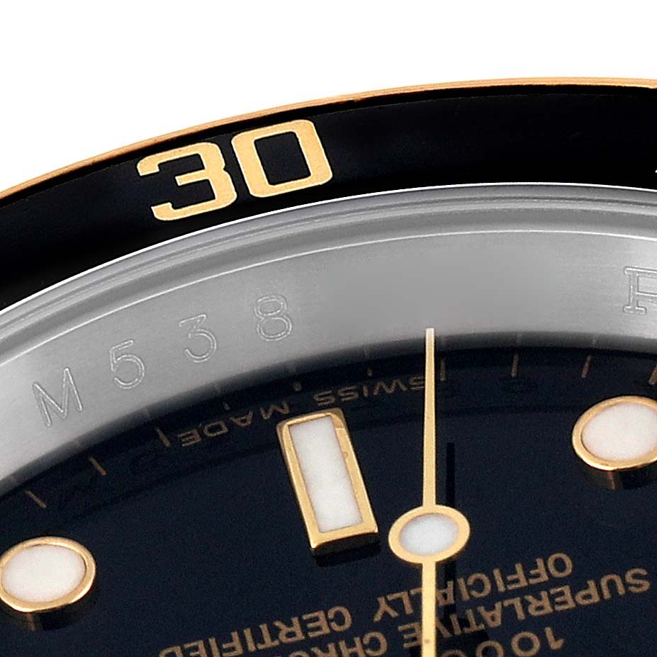 The image shows a close-up of the dial and bezel of a Rolex Submariner 16613 Men's Steel and Gold (two tone) Black Dial 16613 Men's Steel and Gold (two tone) Black Dial watch, specifically highlighting the '30' mark on the bezel.