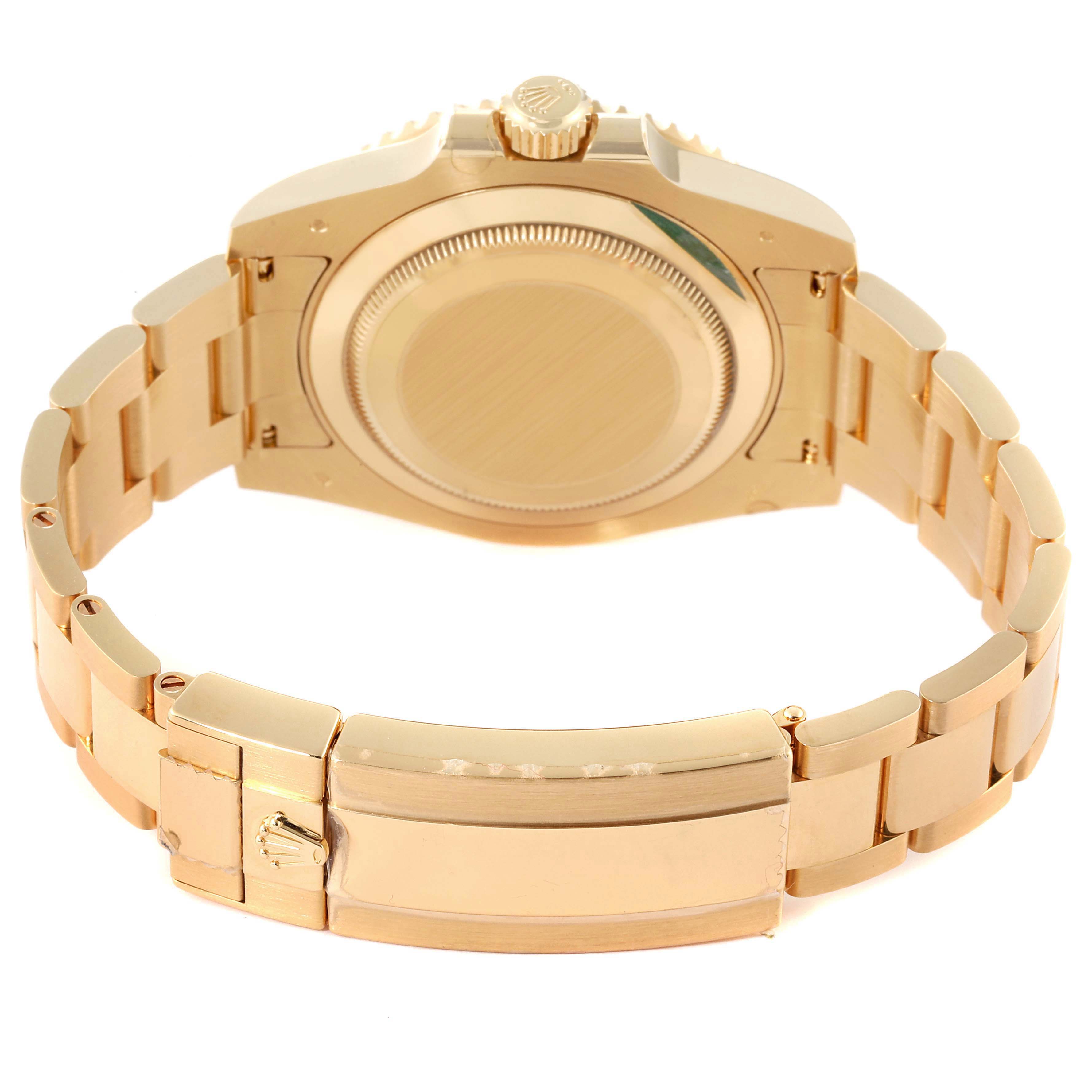 This image shows the back view of a Rolex Submariner 116618 Men's Yellow Gold Blue Dial 116618 Men's Yellow Gold Blue Dial watch, highlighting the case back and bracelet with the clasp.