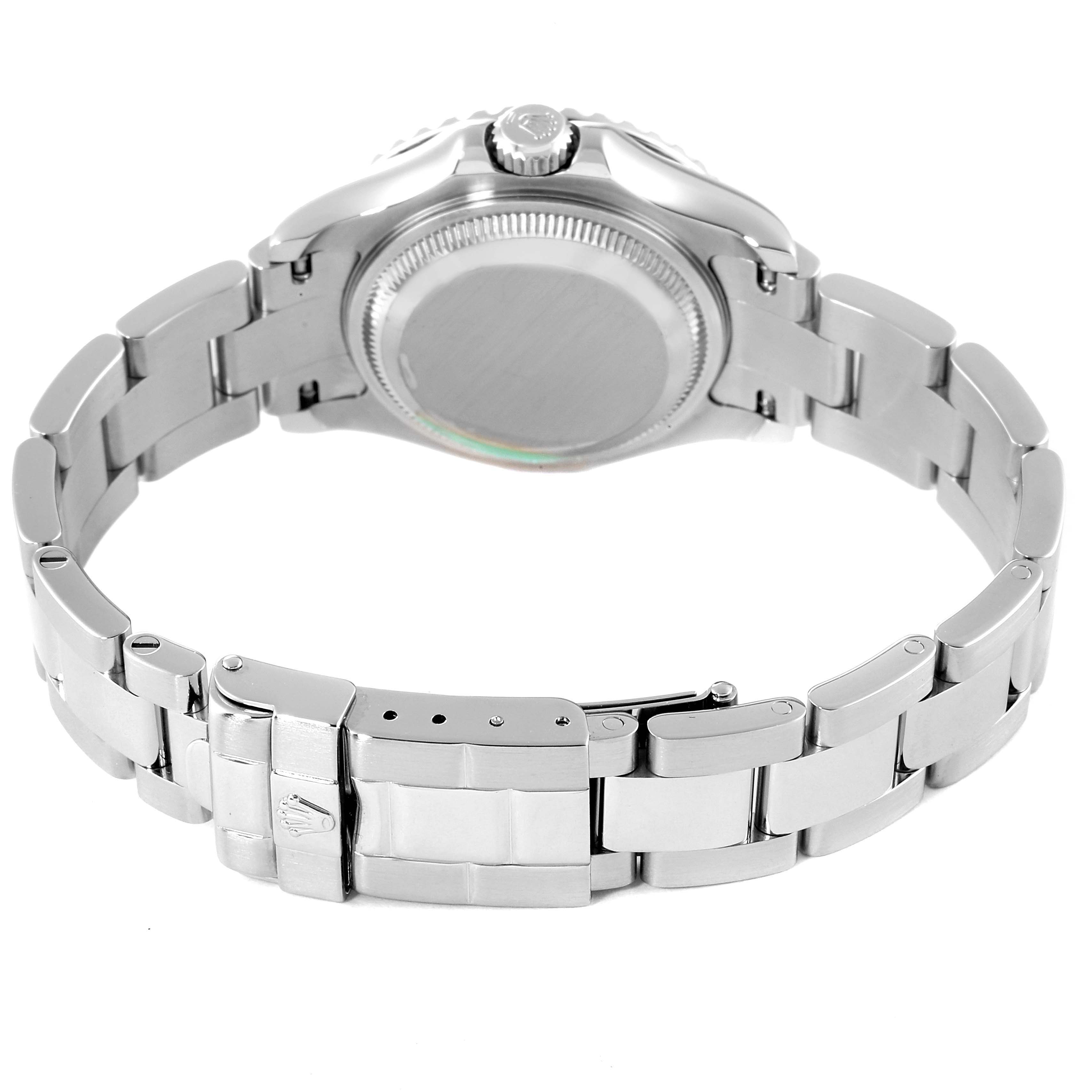 This image shows the back view of a Rolex Yacht-Master 169622 Women's Platinum Silver Dial 169622 Women's Platinum Silver Dial watch, highlighting its case back, crown, and metal bracelet with clasp.
