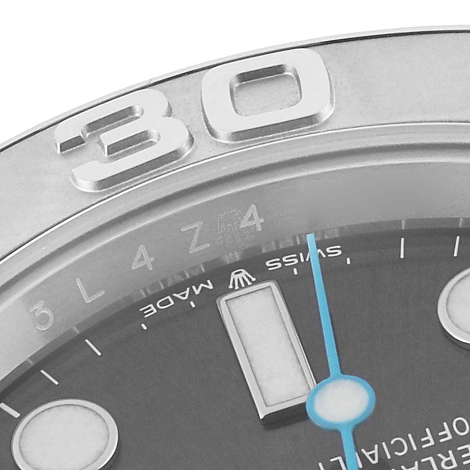 This close-up image shows the bezel with a "30" mark, part of the dial, and hands of the Rolex Yacht-Master 126622 Men's Stainless Steel Grey Dial 126622 Men's Stainless Steel Grey Dial watch.