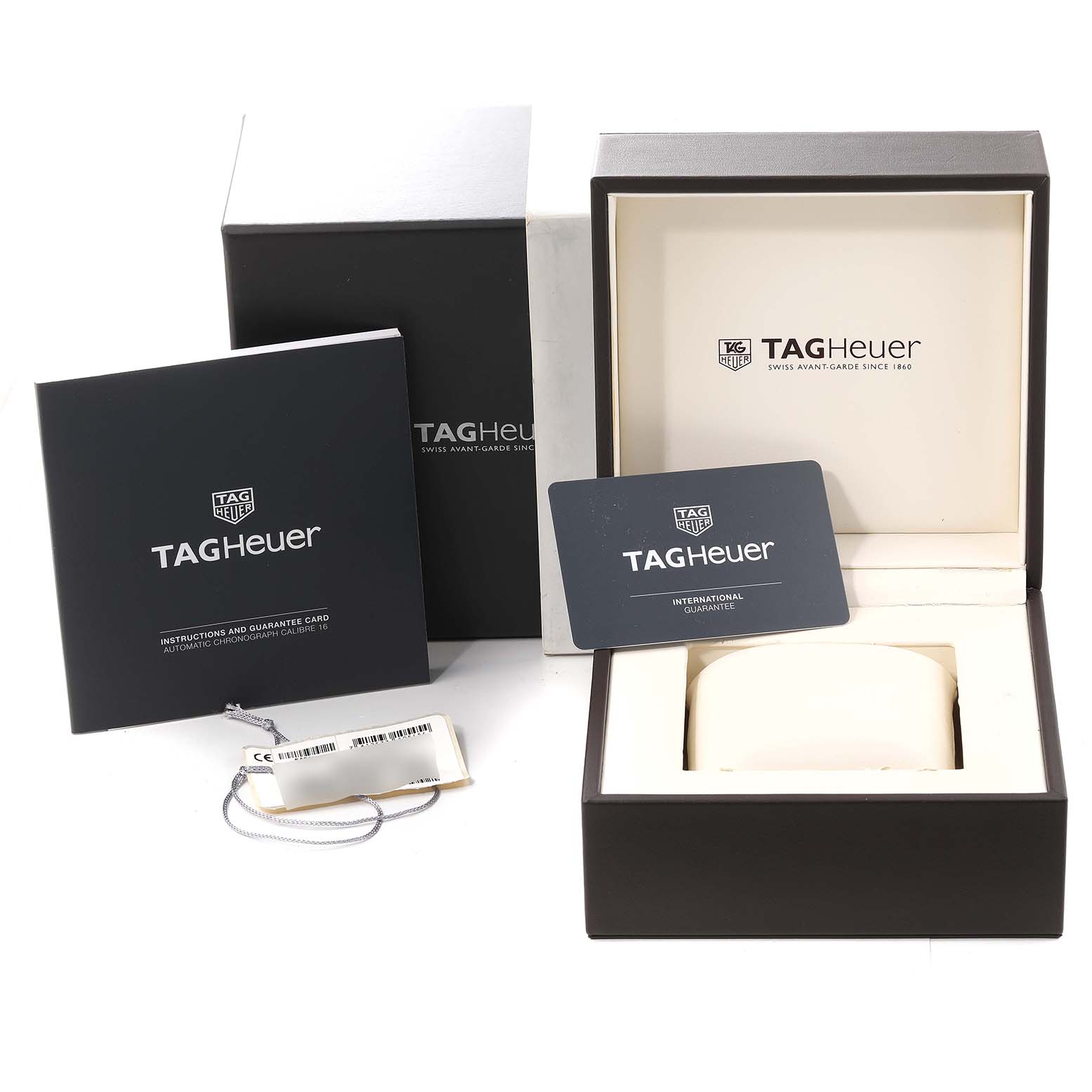 The image shows the packaging, instruction manual, guarantee card, and box for a Tag Heuer Aquaracer CAK2111.BA0833 Men's Stainless Steel Black Dial CAK2111.BA0833 Men's Stainless Steel Black Dial watch.