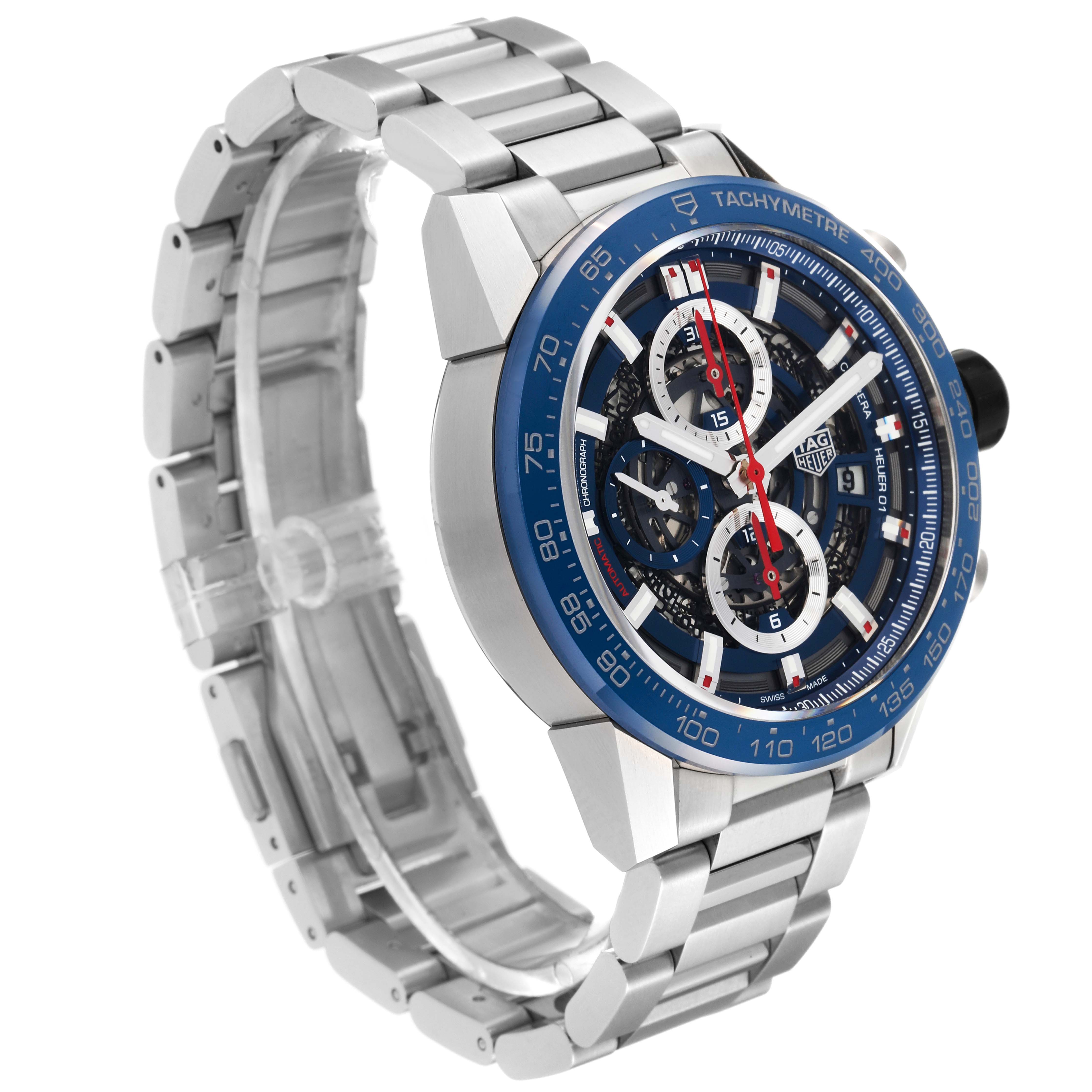 The image shows a side angle of the Carrera model by Tag Heuer, highlighting the watch face and metal bracelet.