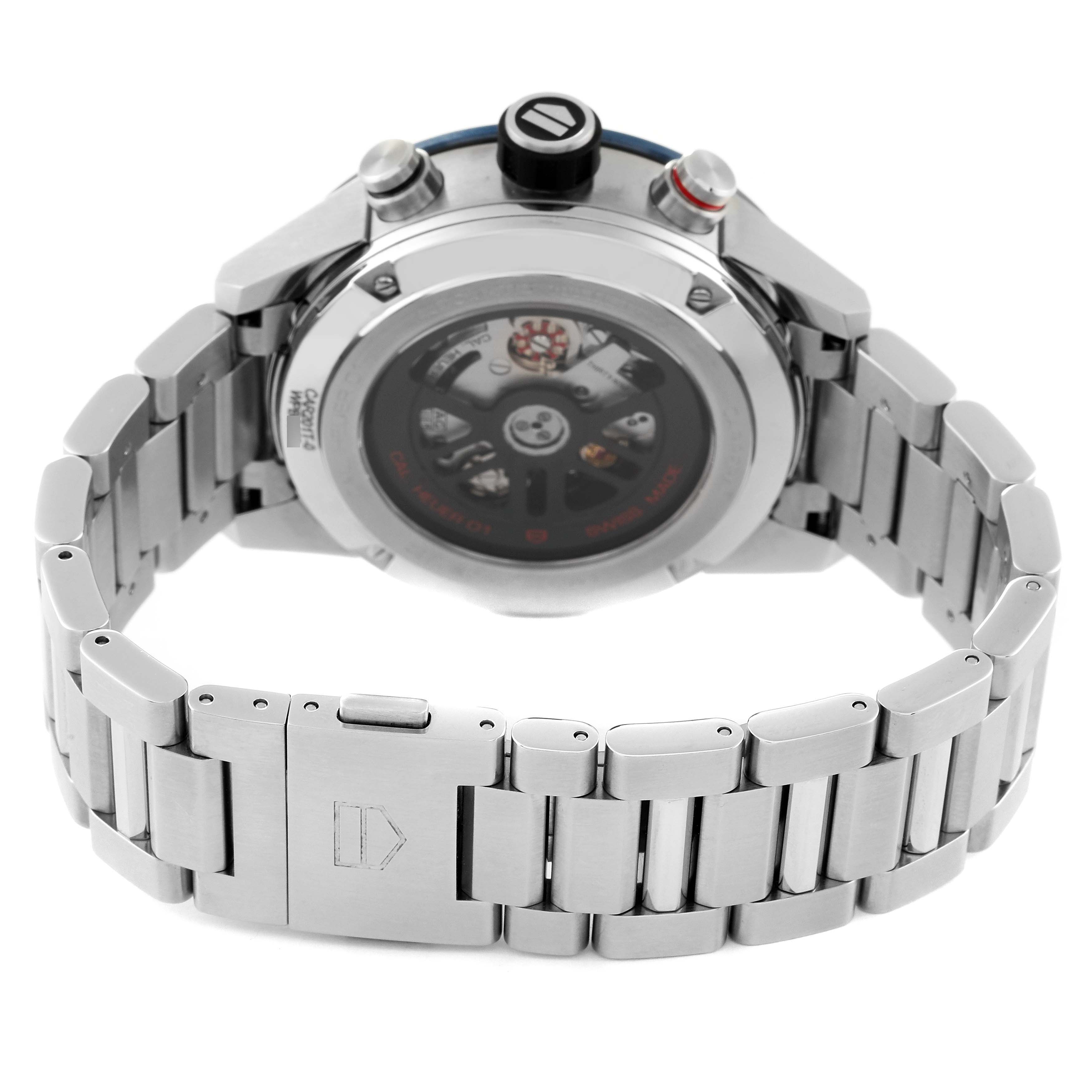 The image shows the back and side view of a Tag Heuer Carrera CAR201T Men's Stainless Steel Blue Dial CAR201T Men's Stainless Steel Blue Dial watch, highlighting its metal bracelet and transparent case back.