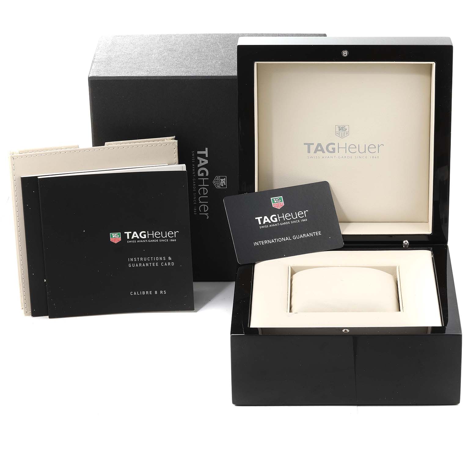 The image shows the packaging, instruction manuals, guarantee card, and an empty watch box for a Tag Heuer Carrera WAV5112.BA0901 Men's Stainless Steel Silver Dial WAV5112.BA0901 Men's Stainless Steel Silver Dial model.