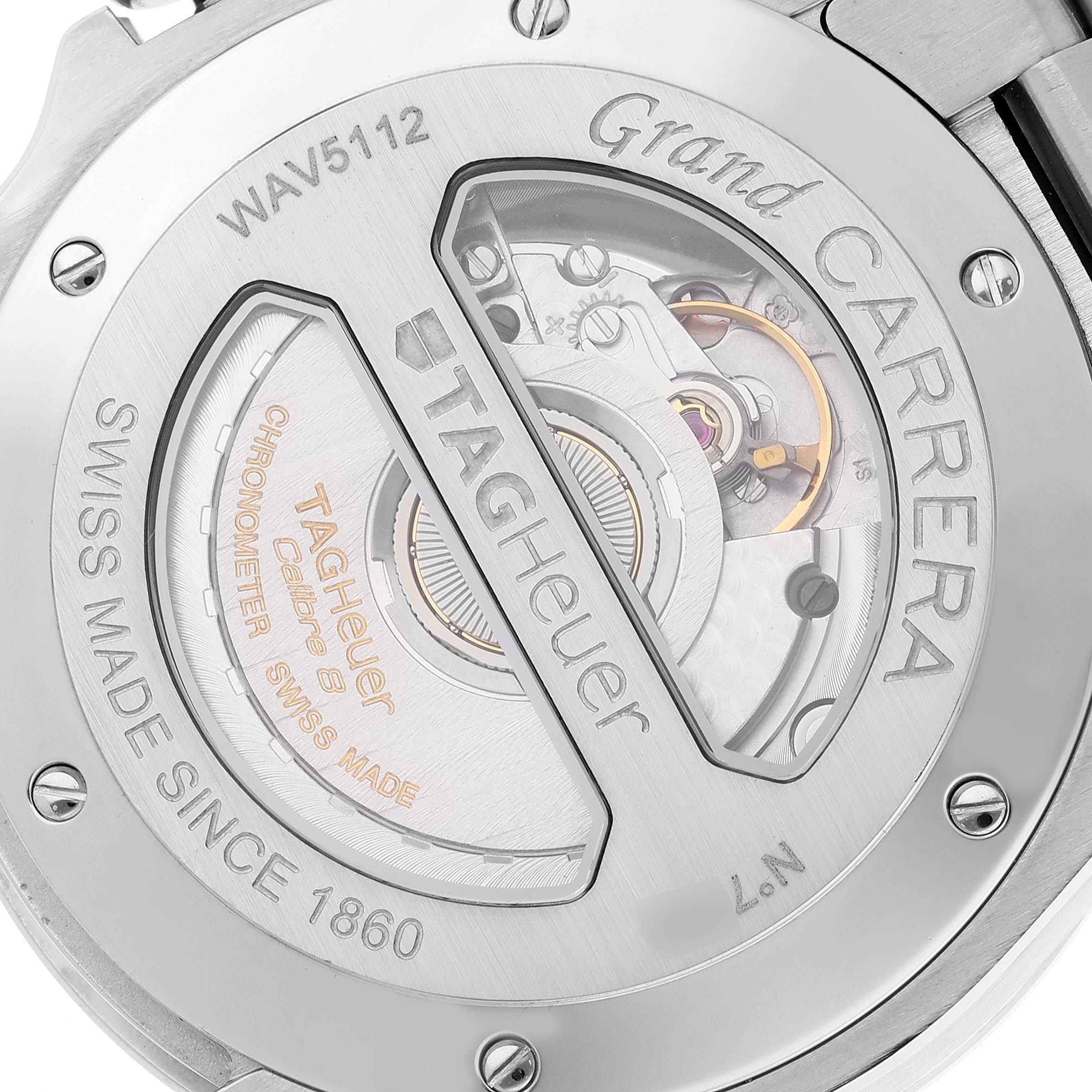 This image shows the case back of a Tag Heuer Carrera WAV5112.BA0901 Men's Stainless Steel Silver Dial WAV5112.BA0901 Men's Stainless Steel Silver Dial watch, displaying the movement and inscriptions through a transparent window.