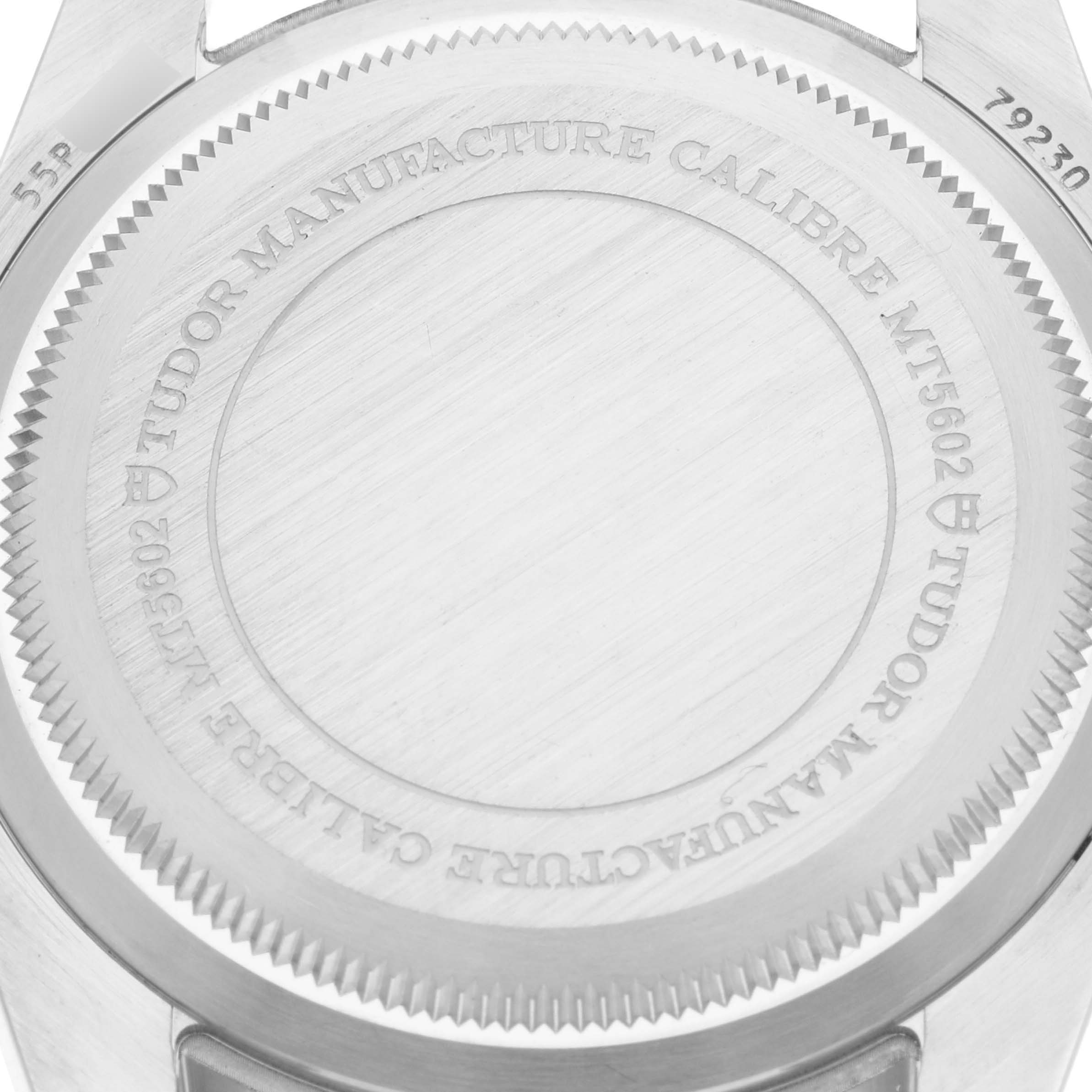 This image shows the back case of the Tudor Heritage Black Bay 79230N Men
s Stainless Steel Black Dial 79230N Men
s Stainless Steel Black Dial watch, displaying the engraved details.