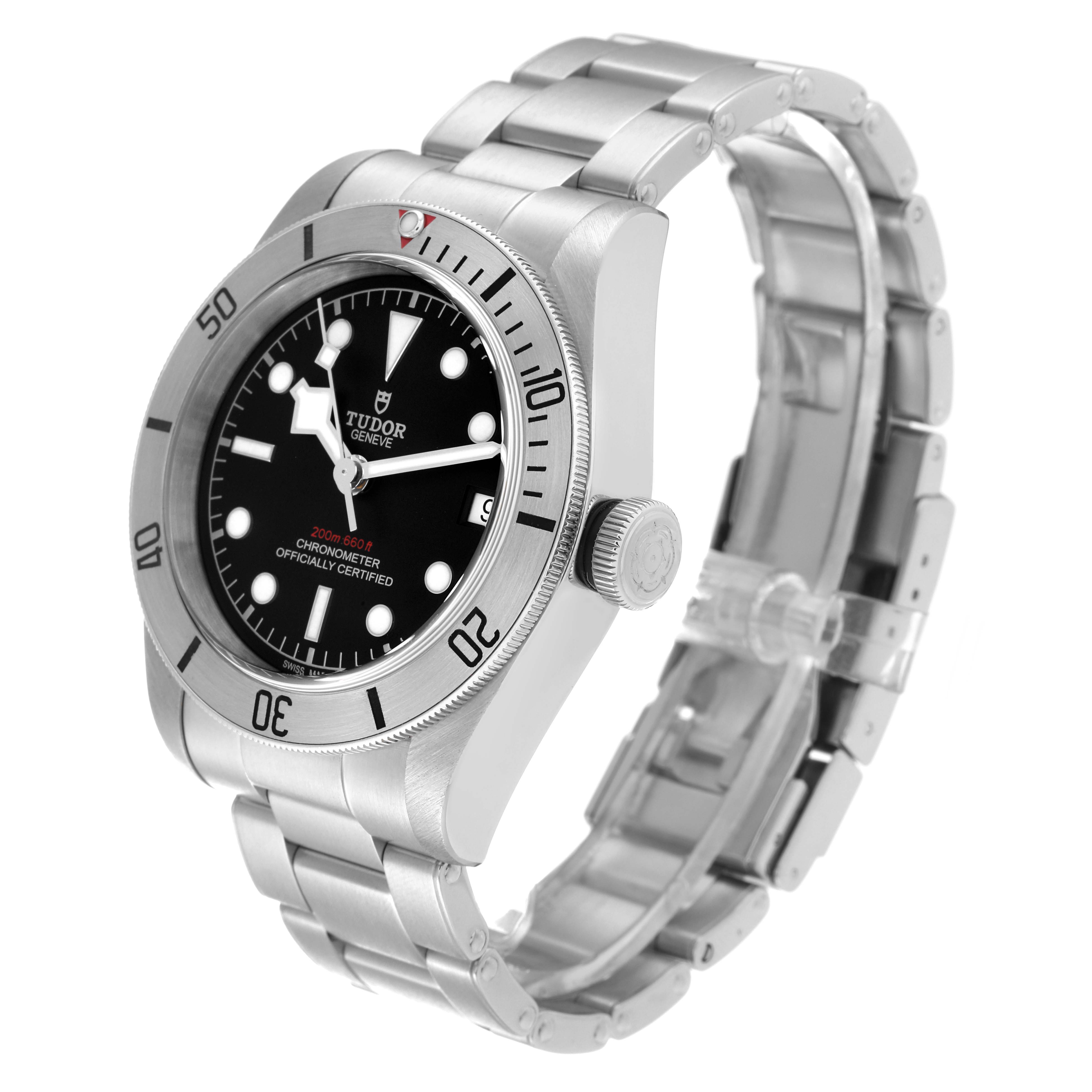 The image shows a Heritage Black Bay model by Tudor at a three-quarter angle, displaying its dial, bezel, crown, and bracelet.