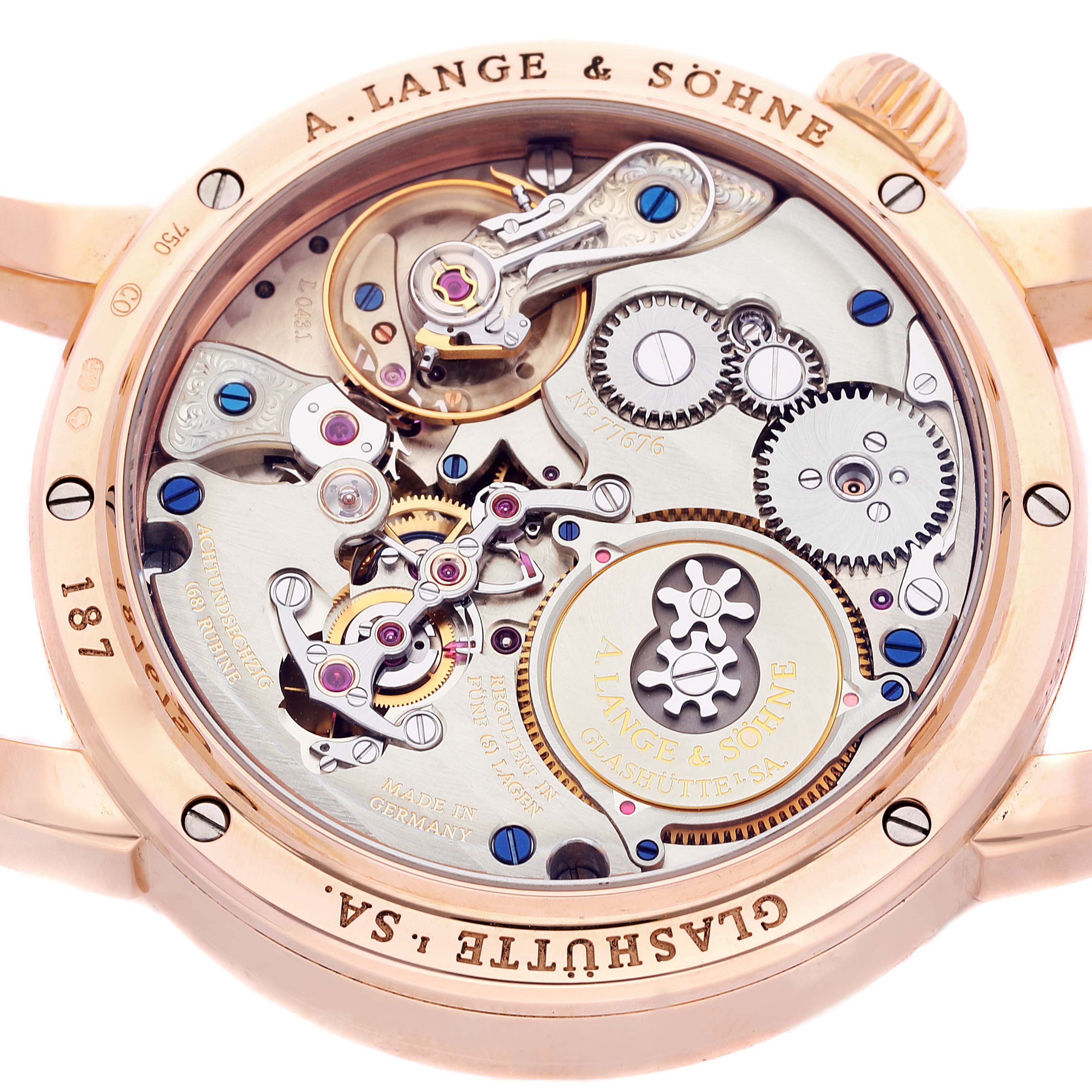 The image displays the back view of an A. Lange & Sohne Zeitwerk 140.032 Men's Rose Gold Silver Dial watch, revealing its intricate mechanical movement.