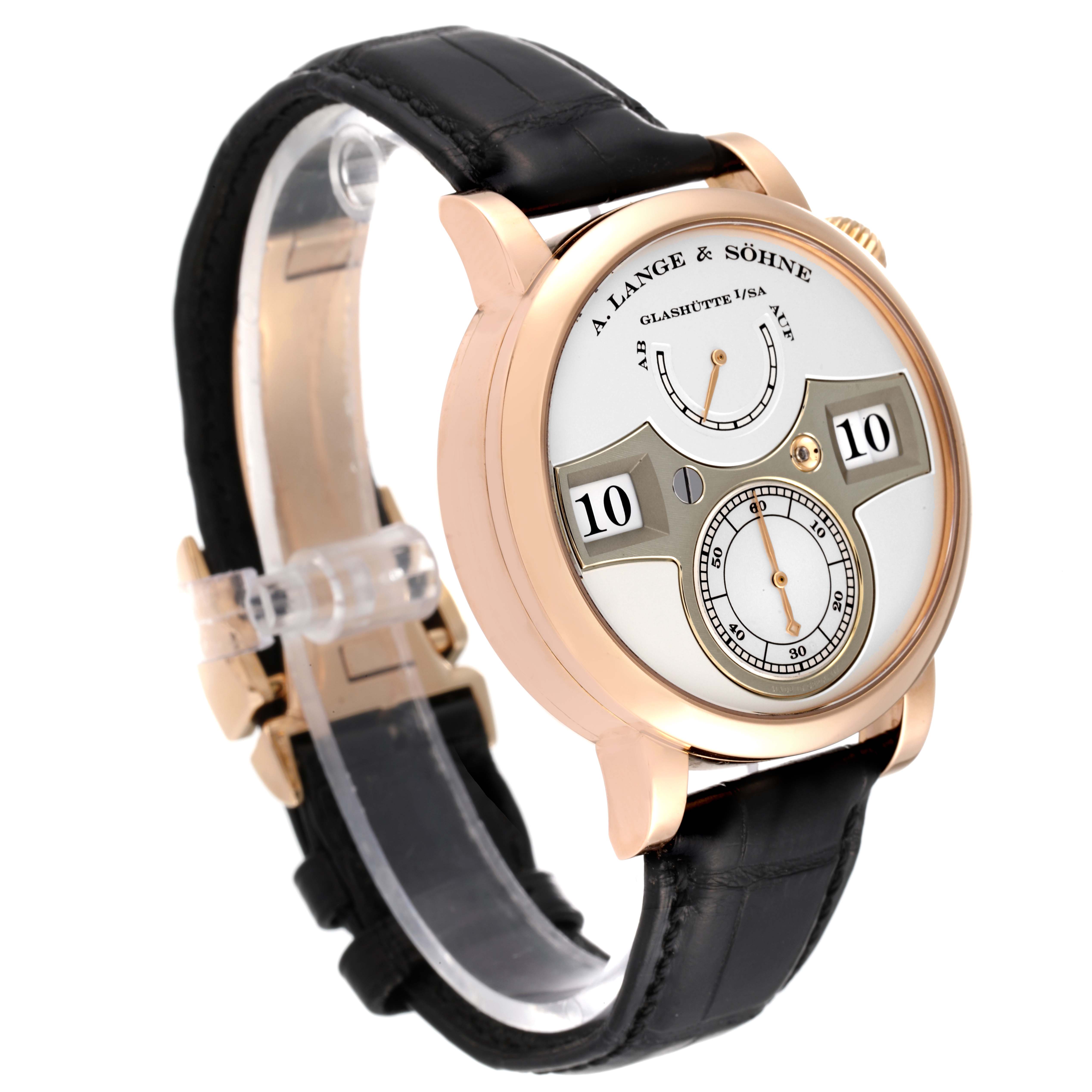 The A. Lange & Sohne Zeitwerk 140.032 Men's Rose Gold Silver Dial watch is shown from a front three-quarter angle, highlighting the dial, case, and leather strap.