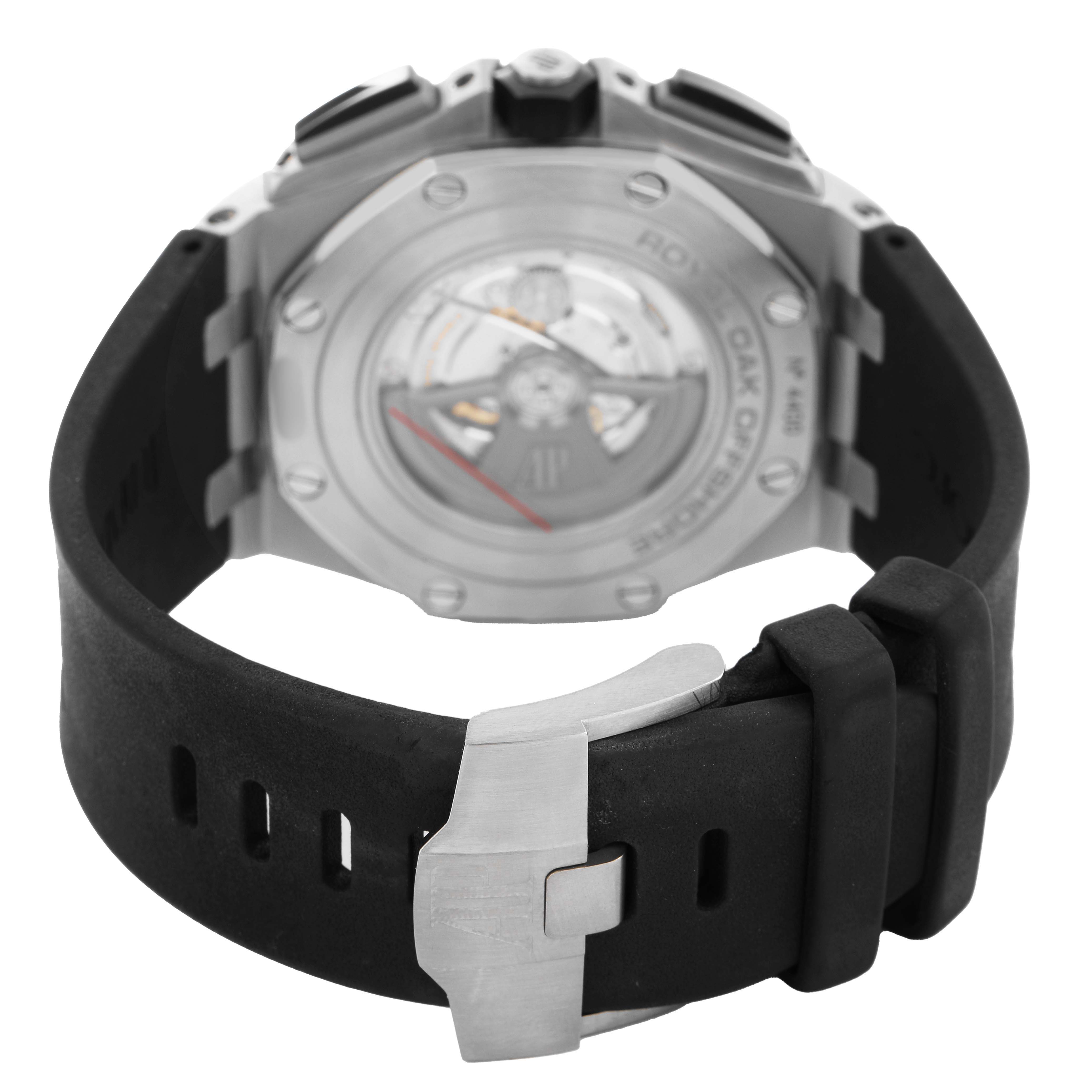 The image shows the back view of an Audemars Piguet Royal Oak Offshore 26400SO.OO.A002CA.01 Men's Stainless Steel Silver Dial, highlighting the case back and rubber strap with a clasp.
