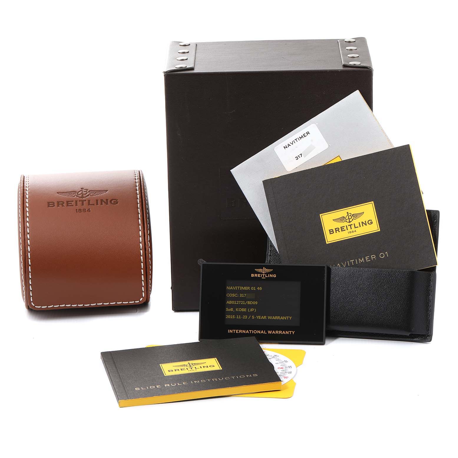 The image shows packaging, a leather case, manuals, warranty cards, and instructions for the Breitling Navitimer AB0127-211-B1A1 Men's Stainless Steel Black Dial AB0127-211-B1A1 Men's Stainless Steel Black Dial watch model.