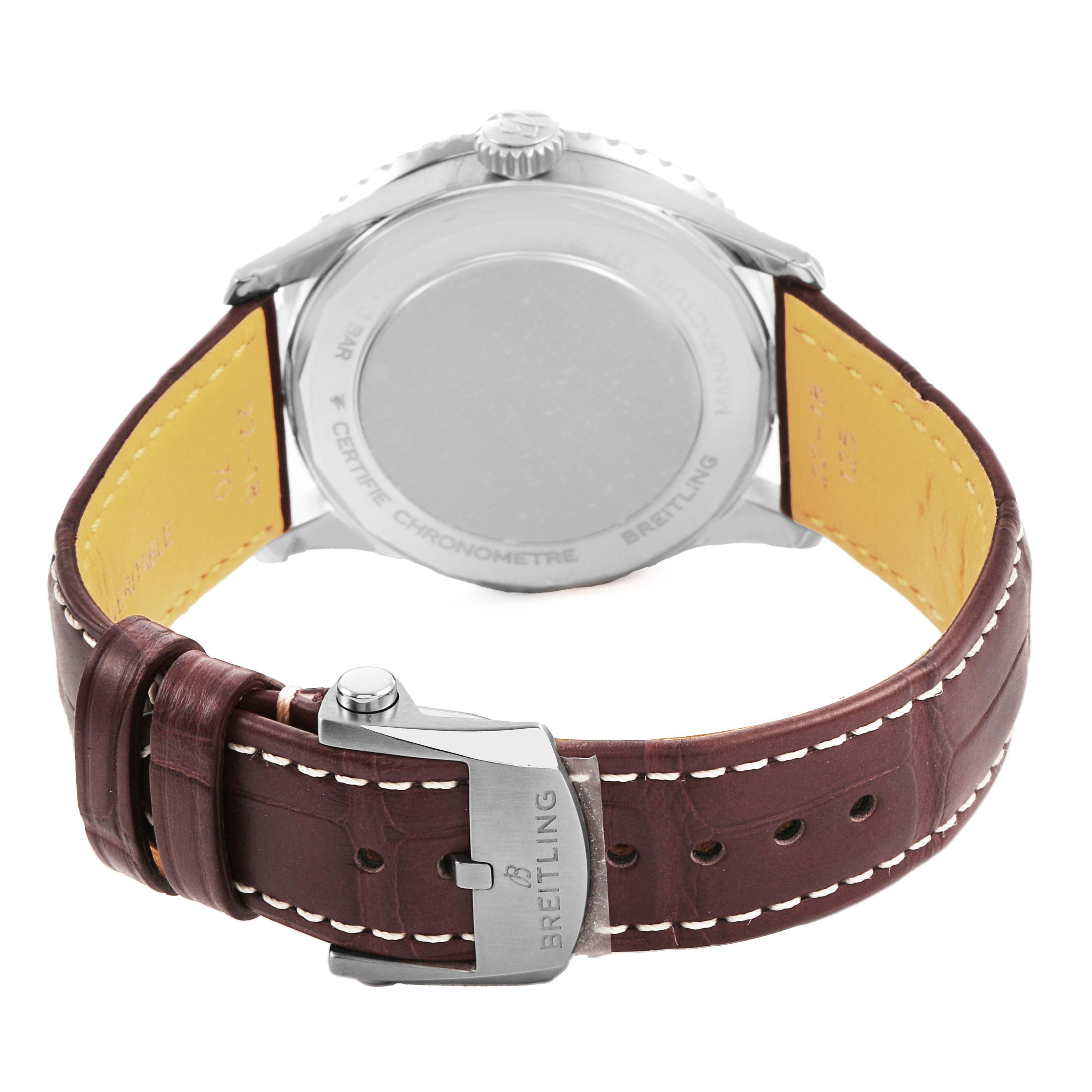 The image shows the back of the Breitling Navitimer A32310 Men's Stainless Steel Silver Dial watch, focusing on the case back and brown leather strap.