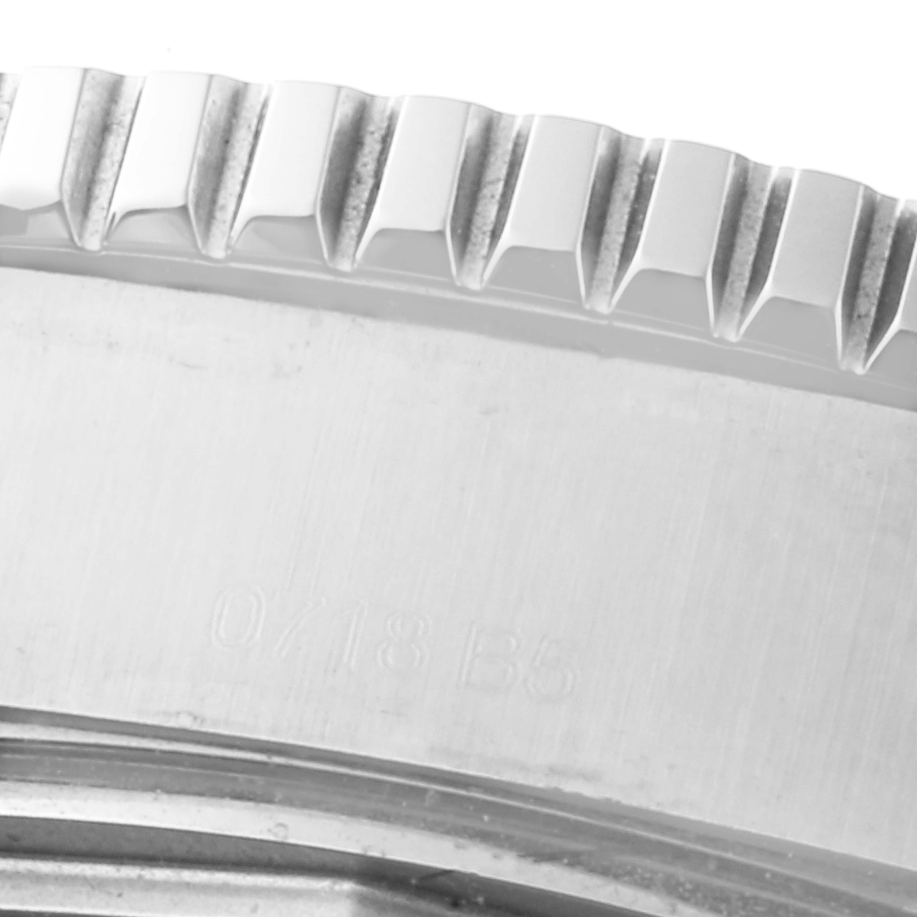 The image shows a close-up angled view of the bezel edge from a Breitling Superocean A17392D8/C910 Men's Stainless Steel Black Dial A17392D8/C910 Men's Stainless Steel Black Dial watch.