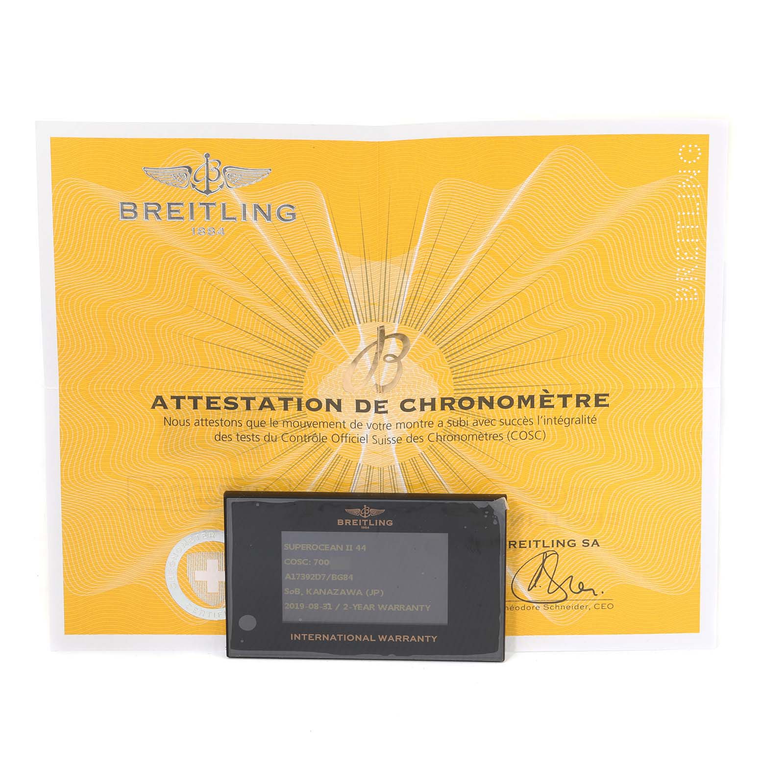 The image shows a Breitling Superocean A17392D8/C910 Men's Stainless Steel Black Dial A17392D8/C910 Men's Stainless Steel Black Dial model's chronometer attestation certificate and international warranty card.