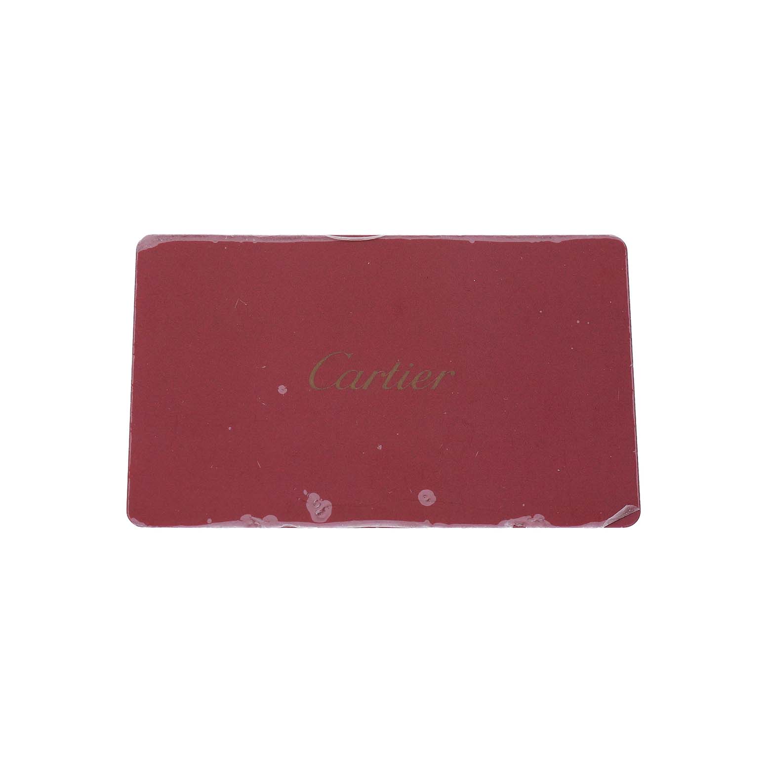 The image shows a flat, horizontal view of a red rectangular Cartier card, related to the Drive de Cartier watch.