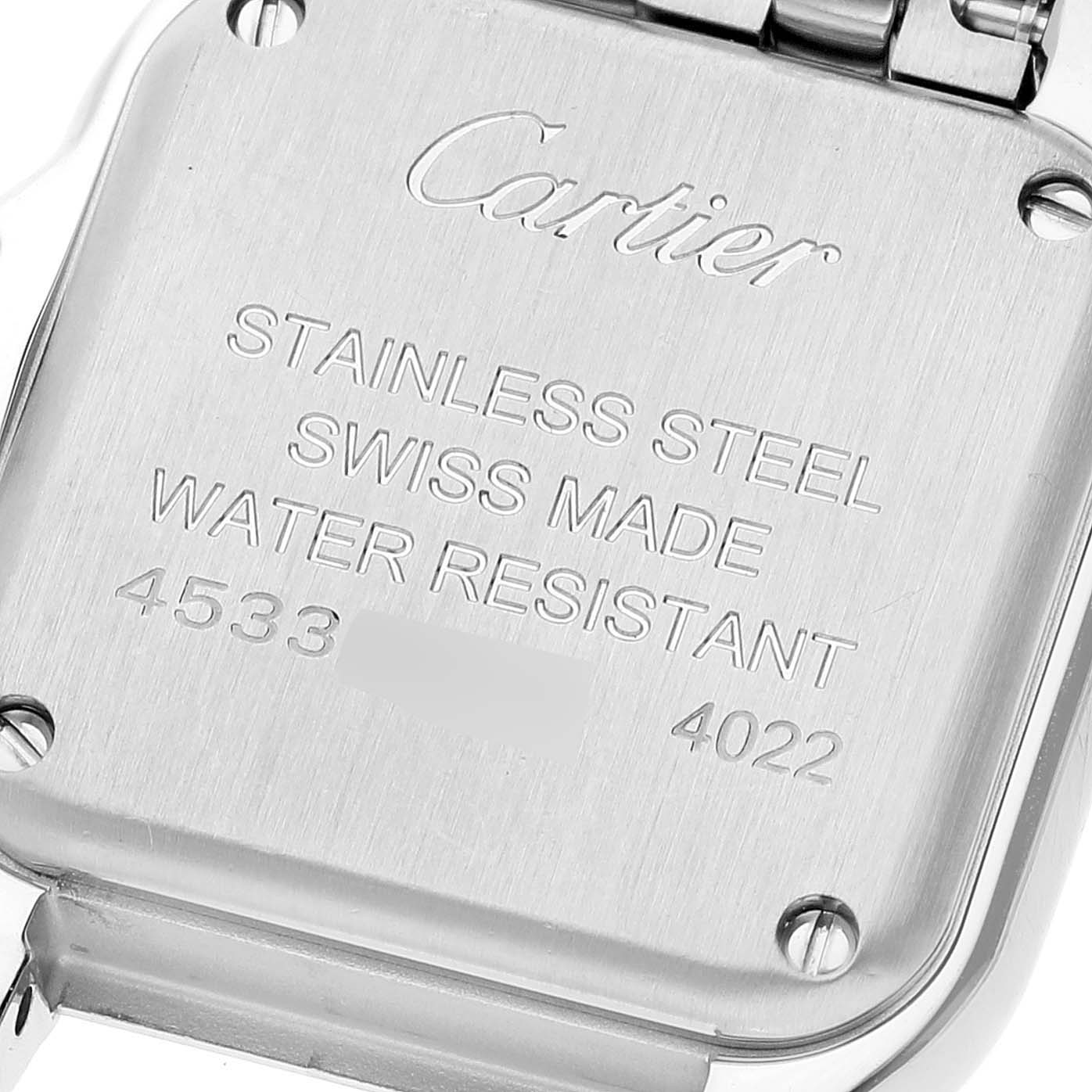 This image shows the angled back case of a Cartier Panthere W4PN0007 Women
s Stainless Steel Silver Dial W4PN0007 Women
s Stainless Steel Silver Dial watch, featuring engravings and visible screws.