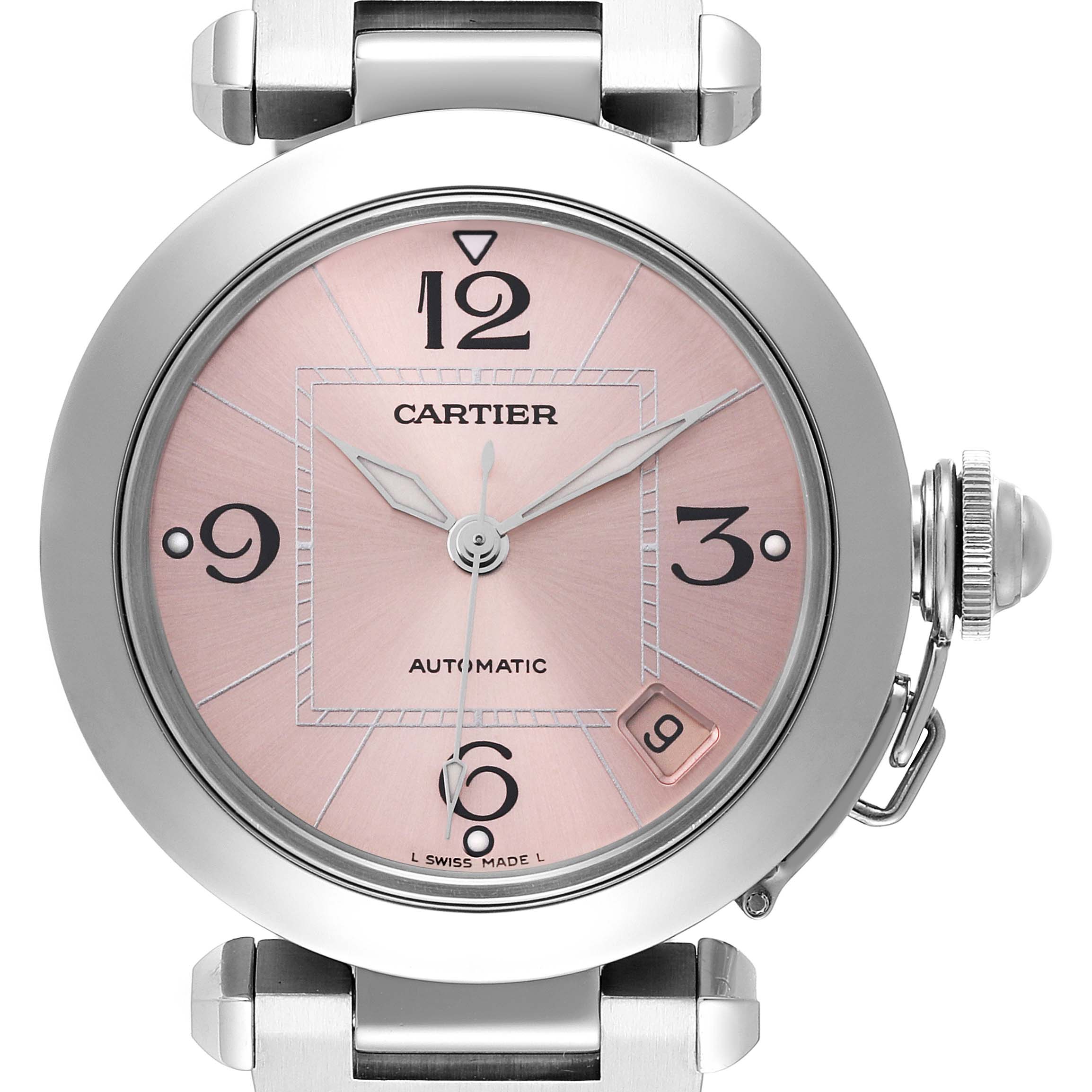 The image shows a front view of the Cartier Pasha W31075M7 Women's Stainless Steel Pink Dial W31075M7 Women's Stainless Steel Pink Dial watch, highlighting the pink dial, numerals, hands, and date display.