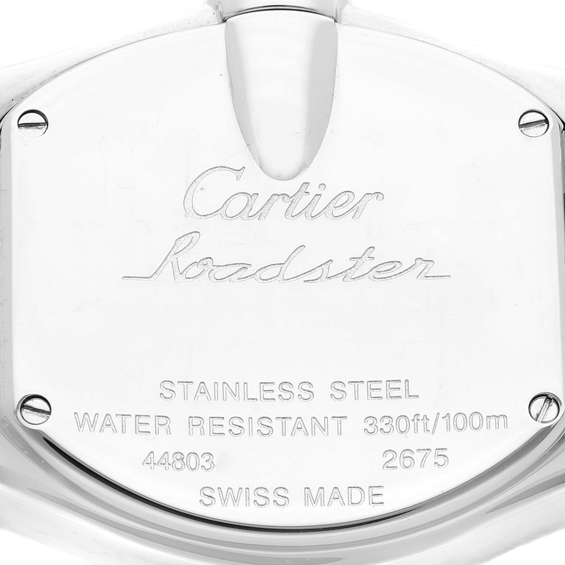 The image shows the back case of a Cartier Roadster W62026Y4 Women's Steel and Gold (two tone) Silver Dial W62026Y4 Women's Steel and Gold (two tone) Silver Dial watch, highlighting its engravings and specifications.