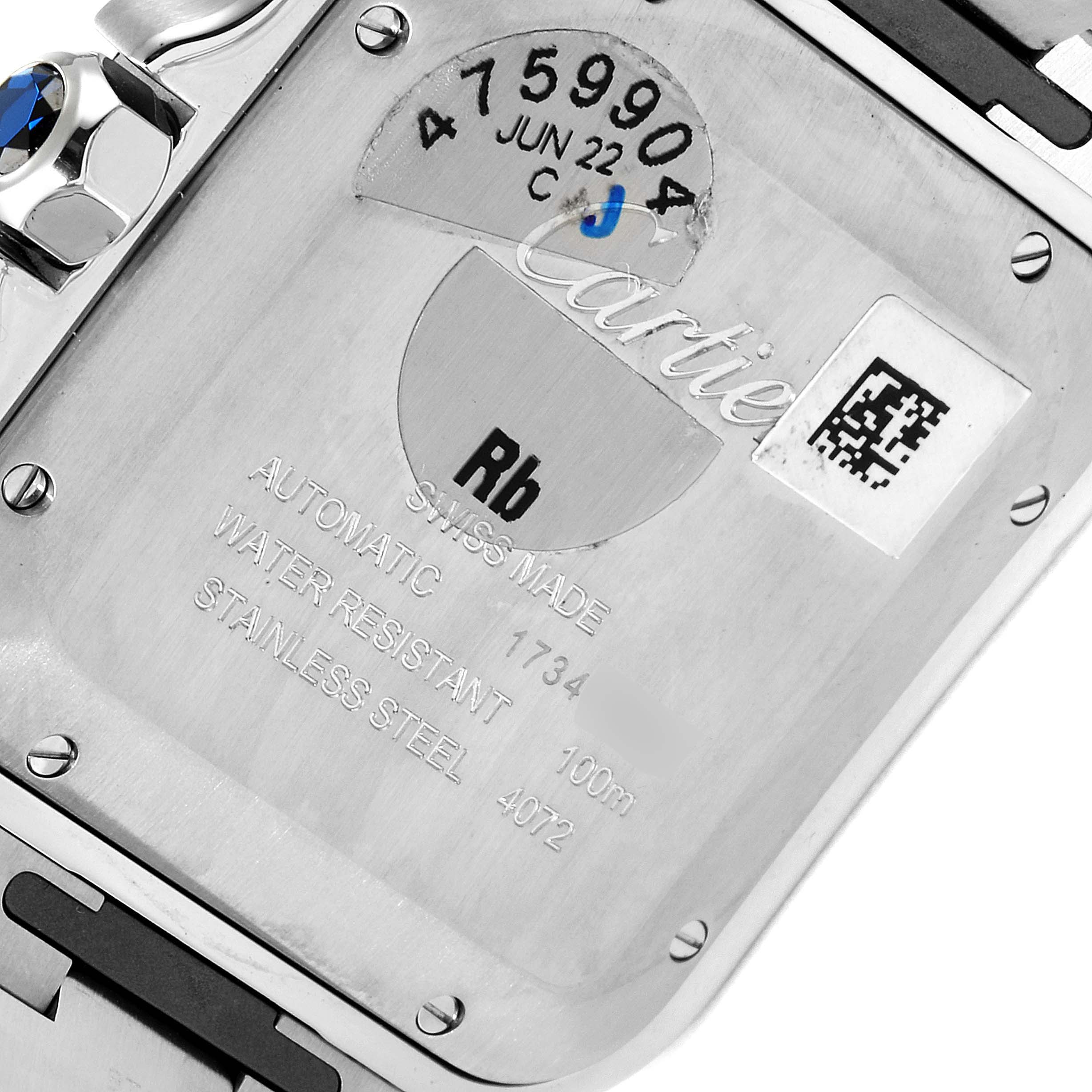 The image shows the back case of a Cartier Santos WSSA0018 Men's Stainless Steel Silver Dial WSSA0018 Men's Stainless Steel Silver Dial watch, highlighting its material and serial number.