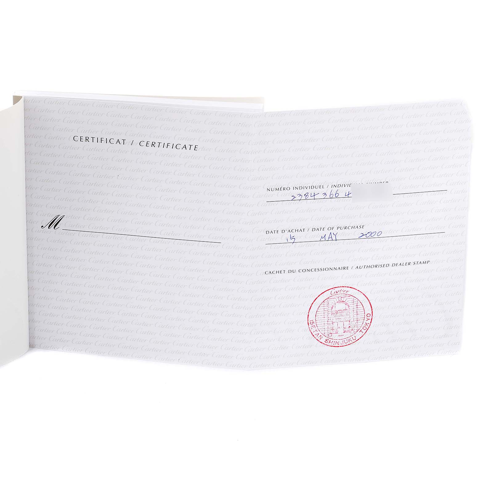 This image shows an open certificate booklet for the Cartier Tank Francaise W51008Q3 Women
s Stainless Steel Silver Dial W51008Q3 Women
s Stainless Steel Silver Dial watch, including purchase details and an authorized dealer stamp.